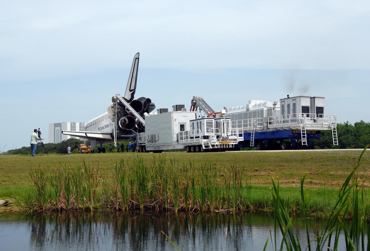 CAPE CANAVERAL, Fla. – At NASA's Kennedy Space Center in Florida, space shuttle Endeavour is towed away from the Shuttle Landing Facility.  It is being taken to the Orbiter Processing Facility #2.  Endeavour landed at 10:48 a.m. EDT, completing a journey of 6.5-million miles  on the STS-127 mission. Umbilicals are still attached to purge the vehicle of any possible residual explosive or toxic fumes. Towing normally begins within four hours after landing and is completed within six hours unless removal of time-sensitive experiments is required on the runway. In the OPF, turnaround processing procedures on Endeavour will include various post-flight deservicing and maintenance functions, which are carried out in parallel with payload removal and the installation of equipment needed for the next mission. The STS-127 mission was the 29th flight to the station, the 23rd flight of Endeavour and the 71st landing at Kennedy.   Photo credit: NASA/Jim Grossmann