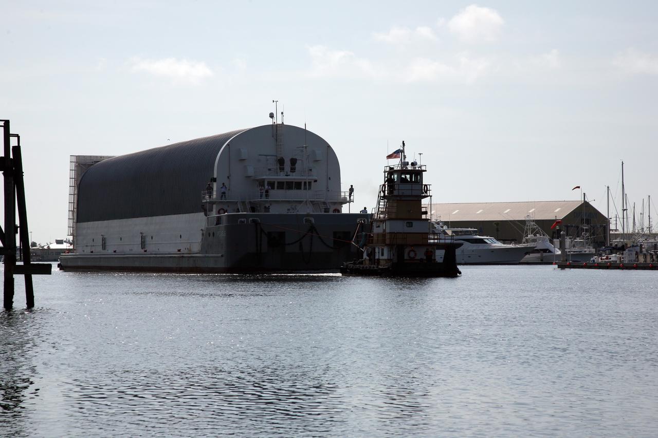 CAPE CANAVERAL, Fla. – NASA's Pegasus barge moves through the locks at Port Canaveral, Fla.  The barge contains the external fuel tank designated ET-133 that will be used for space shuttle Atlantis' STS-129 mission.  The barge is delivering the external tank to the Turn Basin dock at NASA's Kennedy Space Center in Florida where it will be offloaded and moved into the Vehicle Assembly Building.  The tank was shipped aboard the Pegasus from NASA's Michould Assembly Facility near New Orleans. Pegasus was towed to Port Canaveral by the Freedom Star Retrieval Ship.  Photo credit: NASA/Troy Cryder