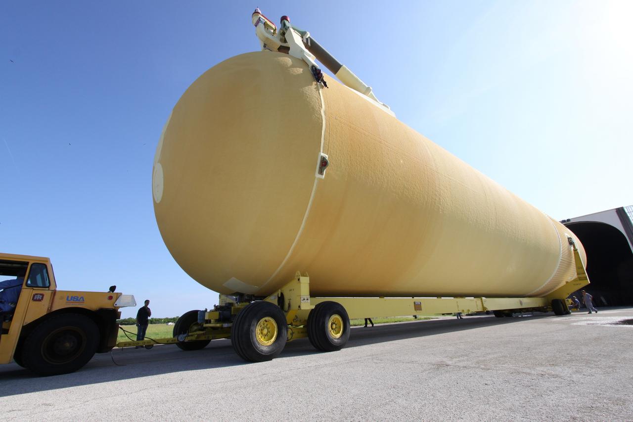 CAPE CANAVERAL, Fla. – At NASA's Kennedy Space Center in Florida, the external fuel tank designated ET-133 is moved out of NASA's Pegasus barge docked at the Turn Basin. The tank will be used for space shuttle Atlantis' STS-129 mission. After unloading, the tank will be moved into a high bay in the Vehicle Assembly Building for checkout. The tank was shipped aboard the Pegasus from NASA's Michoud Assembly Facility near New Orleans. Pegasus was towed to Port Canaveral by the Freedom Star Retrieval Ship. Launch of Atlantis is targeted for November. Photo credit: NASA/Troy Cryder