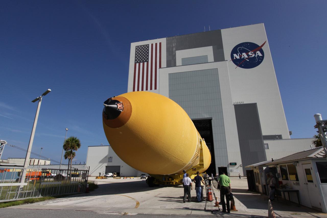 CAPE CANAVERAL, Fla. – At NASA's Kennedy Space Center in Florida, the external fuel tank designated ET-133 is moved toward the open doors of the Vehicle Assembly Building. In the VAB, the tank will be moved into a high bay for checkout. The tank was shipped aboard the Pegasus from NASA's Michoud Assembly Facility near New Orleans. Pegasus was towed to Port Canaveral by the Freedom Star Retrieval Ship. Launch of Atlantis is targeted for November. Photo credit: NASA/Troy Cryder