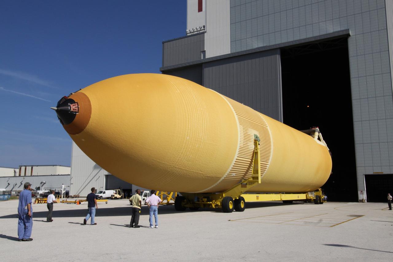 CAPE CANAVERAL, Fla. – At NASA's Kennedy Space Center in Florida, the external fuel tank designated ET-133 is moved toward the open doors of the Vehicle Assembly Building. In the VAB, the tank will be moved into a high bay for checkout. The tank was shipped aboard the Pegasus from NASA's Michoud Assembly Facility near New Orleans. Pegasus was towed to Port Canaveral by the Freedom Star Retrieval Ship. Launch of Atlantis is targeted for November. Photo credit: NASA/Troy Cryder