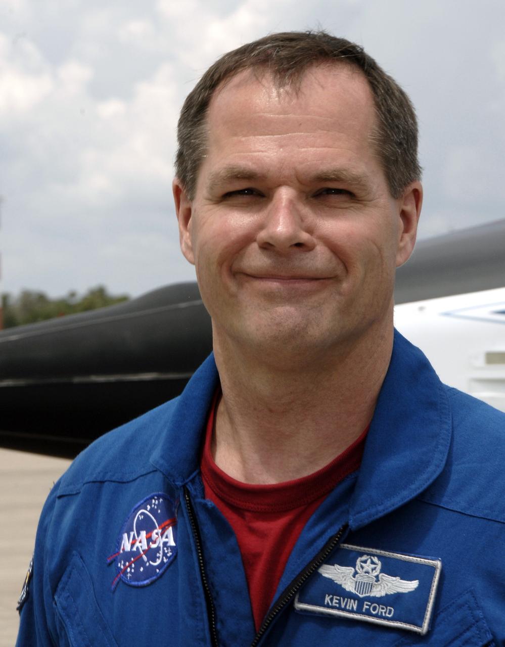 CAPE CANAVERAL, Fla. – Space shuttle Discovery's STS-128 mission crew members arrive in T-38 training jets at NASA Kennedy Space Center's Shuttle Landing Facility. Pilot Kevin Ford is seen here.The astronauts will be taking part in terminal countdown demonstration test activities that include equipment familiarization and emergency egress training, and will culminate in a simulated launch countdown aboard Discovery. The mission will deliver a new crew member and 33,000 pounds of equipment to the International Space Station. The equipment includes science and storage racks, a freezer to store research samples, a new sleeping compartment and the COLBERT treadmill. Launch of Discovery is targeted for late August. Photo credit: NASA/Kim Shiflett