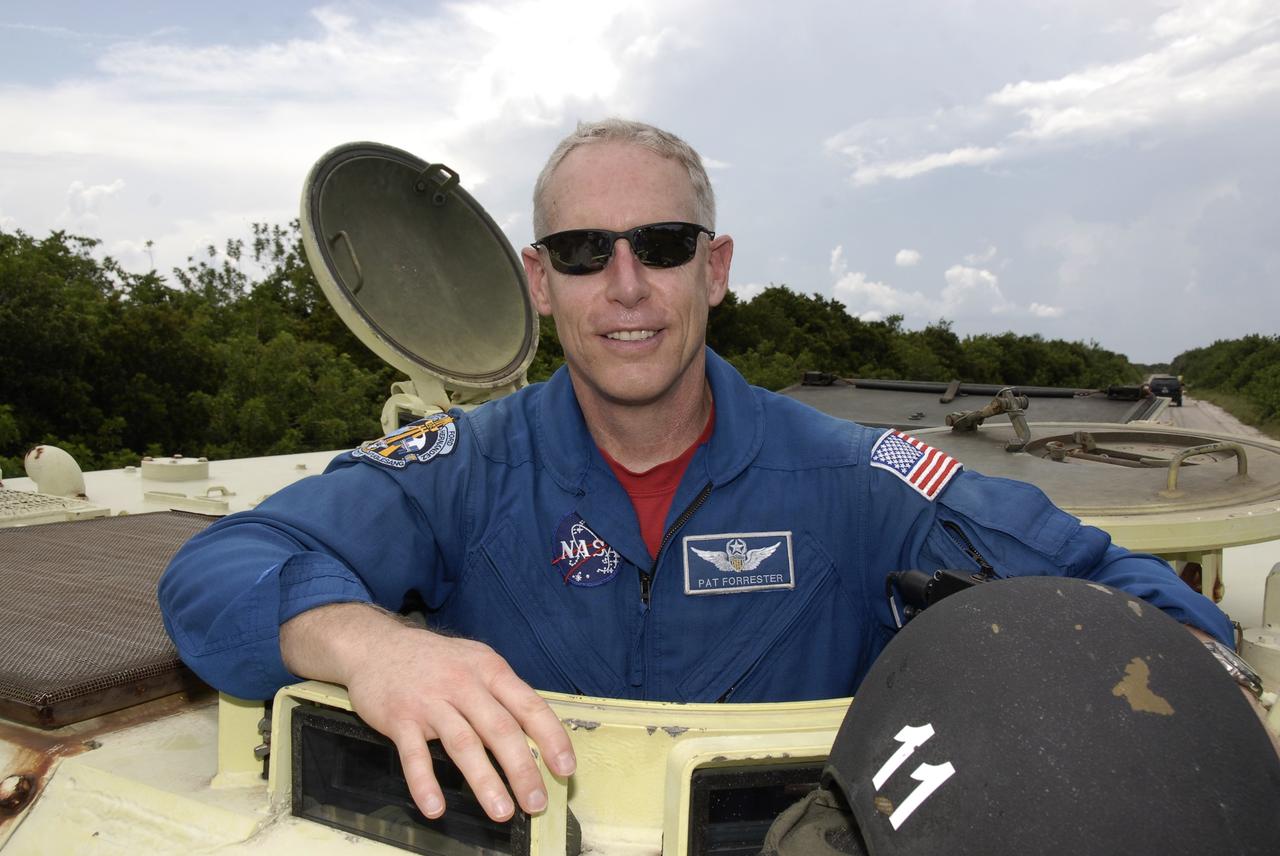 CAPE CANAVERAL, Fla. – At NASA's Kennedy Space Center in Florida, STS-128 Mission Specialist Patrick Forrester has completed his turn at driving an M-113 armored personnel carrier. The crew is at Kennedy for a launch dress rehearsal called the terminal countdown demonstration test, or TCDT, which includes emergency exit training and equipment familiarization, as well as a simulated launch countdown.  Launch of Discovery is targeted for late August. Photo credit: NASA/Kim Shiflett