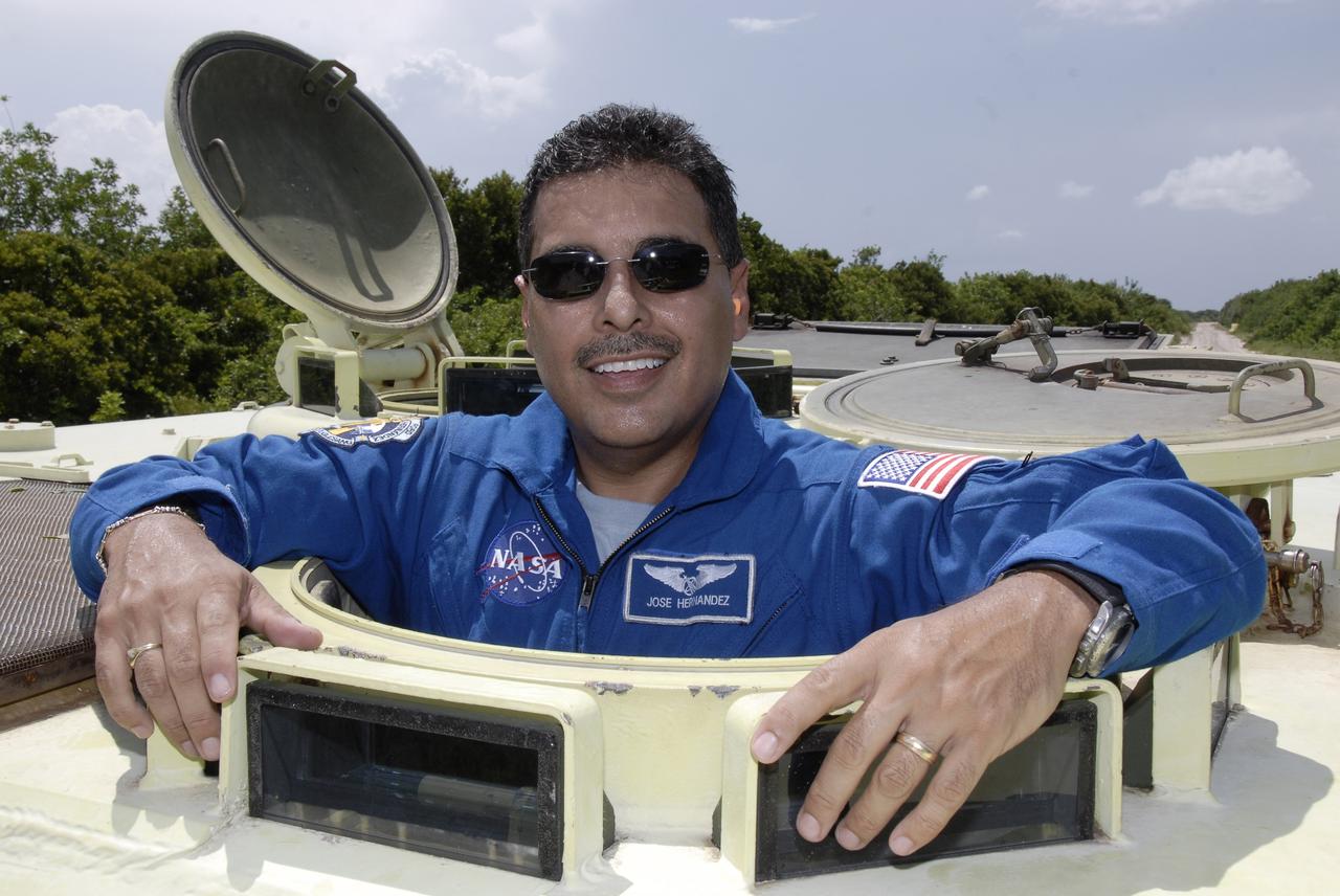 CAPE CANAVERAL, Fla. – At NASA's Kennedy Space Center in Florida, STS-128 Mission Specialist Jose Hernandez has completed his turn driving an M-113 armored personnel carrier.  The crew is at Kennedy for a launch dress rehearsal called the terminal countdown demonstration test, or TCDT, which includes emergency exit training and equipment familiarization, as well as a simulated launch countdown.  Launch of Discovery is targeted for late August. Photo credit: NASA/Kim Shiflett