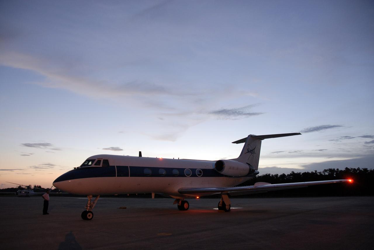 CAPE CANAVERAL, Fla. –At the Shuttle Landing Facility at NASA's Kennedy Space Center in Florida,  one of the two Shuttle Training Aircraft, or STAs, waits to taxi to the runway.  STS-128 Commander Rick Sturckow and Pilot Kevin Ford are using the STAs to practice shuttle landings.  The practice is in preparation for launch of space shuttle Discovery's STS-128 mission in late August to the International Space Station. The STA is a Grumman American Aviation-built Gulfstream II jet that was modified to simulate a shuttle’s cockpit, motion and visual cues, and handling qualities. The STS-128 crew is at Kennedy for a launch dress rehearsal called the terminal countdown demonstration test, or TCDT, which includes emergency exit training and equipment familiarization, as well as a simulated launch countdown.  Discovery will deliver 33,000 pounds of equipment to the station, including science and storage racks, a freezer to store research samples, a new sleeping compartment and the COLBERT treadmill. Photo credit: NASA/Kim Shiflett