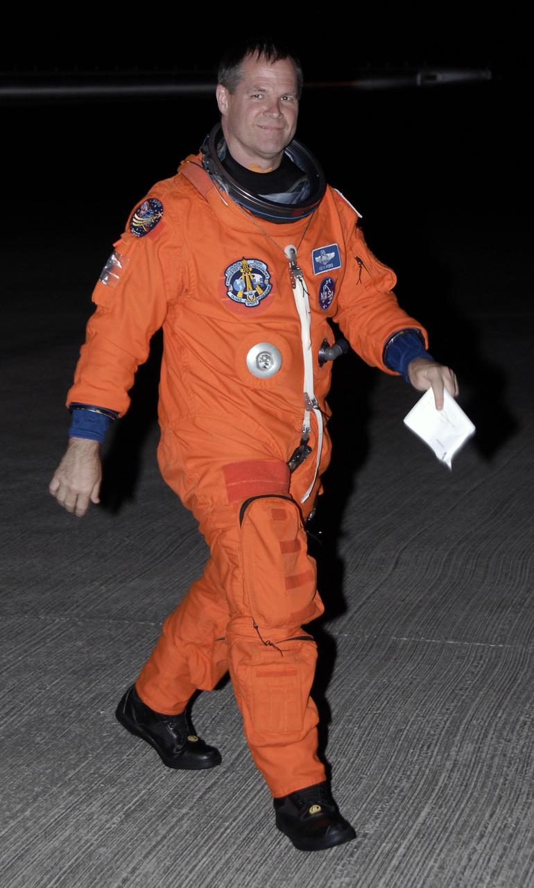CAPE CANAVERAL, Fla. –At the Shuttle Landing Facility at NASA's Kennedy Space Center in Florida, STS-128 Pilot Kevin Ford walks away from the Shuttle Training Aircraft, or STA, after completing shuttle landing practice.  The practice is in preparation for launch of space shuttle Discovery's STS-128 mission in late August to the International Space Station. The STA is a Grumman American Aviation-built Gulfstream II jet that was modified to simulate a shuttle’s cockpit, motion and visual cues, and handling qualities. The STS-128 crew is at Kennedy for a launch dress rehearsal called the terminal countdown demonstration test, or TCDT, which includes emergency exit training and equipment familiarization, as well as a simulated launch countdown.  Discovery will deliver 33,000 pounds of equipment to the station, including science and storage racks, a freezer to store research samples, a new sleeping compartment and the COLBERT treadmill. Photo credit: NASA/Kim Shiflett