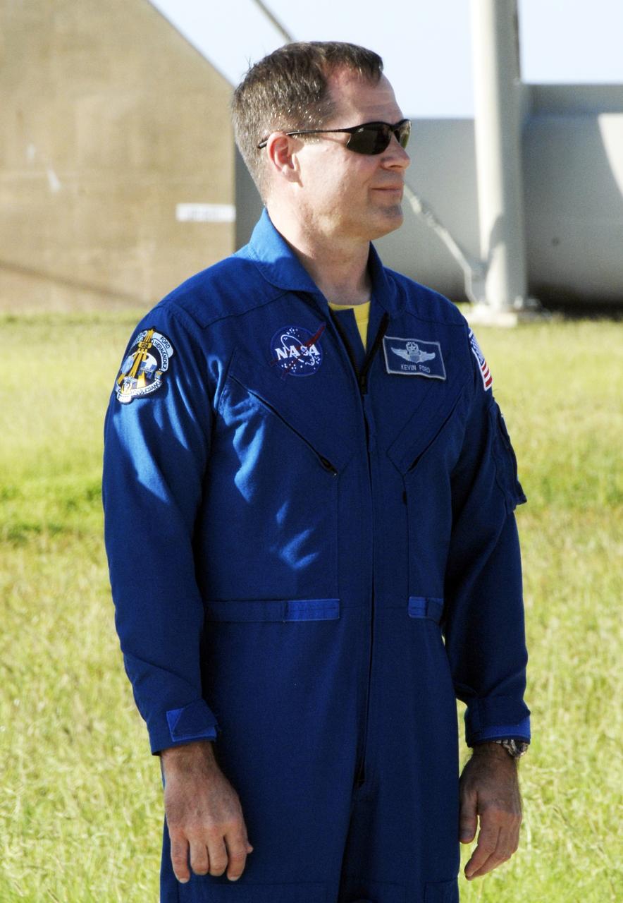 CAPE CANAVERAL, Fla. – At NASA's Kennedy Space Center in Florida, STS-128 Pilot Kevin Ford waits his turn to answer questions from the media during a question-and-answer session near Launch Pad 39A. The crew is at Kennedy for a launch dress rehearsal called the terminal countdown demonstration test, or TCDT, which includes emergency exit training and equipment familiarization, as well as a simulated launch countdown. Discovery will deliver 33,000 pounds of equipment to the station, including science and storage racks, a freezer to store research samples, a new sleeping compartment and the COLBERT treadmill. Photo credit: NASA/Kim Shiflett
