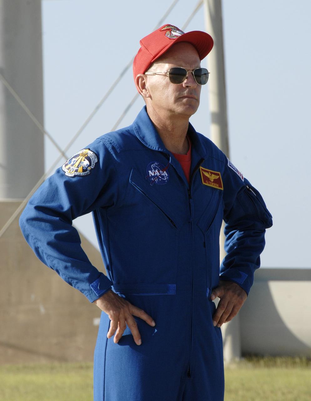 CAPE CANAVERAL, Fla. – At NASA's Kennedy Space Center in Florida, STS-128 Commander Rick Sturckow listens to a question from the media during a question-and-answer session near Launch Pad 39A. The crew is at Kennedy for a launch dress rehearsal called the terminal countdown demonstration test, or TCDT, which includes emergency exit training and equipment familiarization, as well as a simulated launch countdown. Discovery will deliver 33,000 pounds of equipment to the station, including science and storage racks, a freezer to store research samples, a new sleeping compartment and the COLBERT treadmill. Photo credit: NASA/Kim Shiflett
