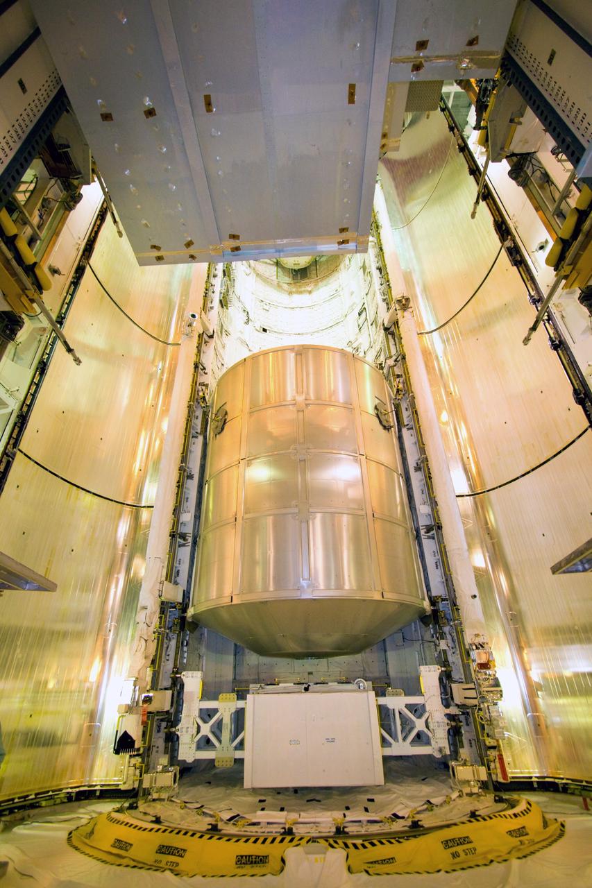 CAPE CANAVERAL, Fla. – On Launch Pad 39A, the payload for space shuttle Discovery's STS-128 mission has been installed in the payload bay. At the bottom is the Lightweight multi-purpose experiment support structure carrier. Above it is the multi-purpose logistics module Leonardo. Discovery will deliver 33,000 pounds of equipment to the station, including science and storage racks, a freezer to store research samples, a new sleeping compartment and the COLBERT treadmill. Launch is targeted for late August. Photo credit: NASA/Jack Pfaller
