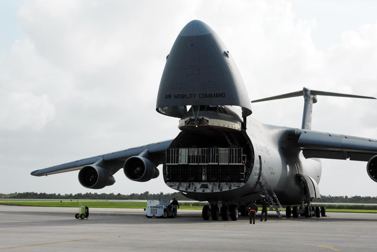CAPE CANAVERAL, Fla. – On NASA Kennedy Space Center's Shuttle Landing Facility, the U.S. Air Force C-5 prepares to offload its cargo, the Express Logistics Carrier 4, or ELC4. The ELC4 is part of the payload for the STS-133 mission. Space shuttle Endeavour will deliver the ELC4 and ELC3 with critical spare components to the International Space Station on the mission.  Endeavour's launch is targeted for late July in 2010.  Photo credit: NASA/Amanda Diller