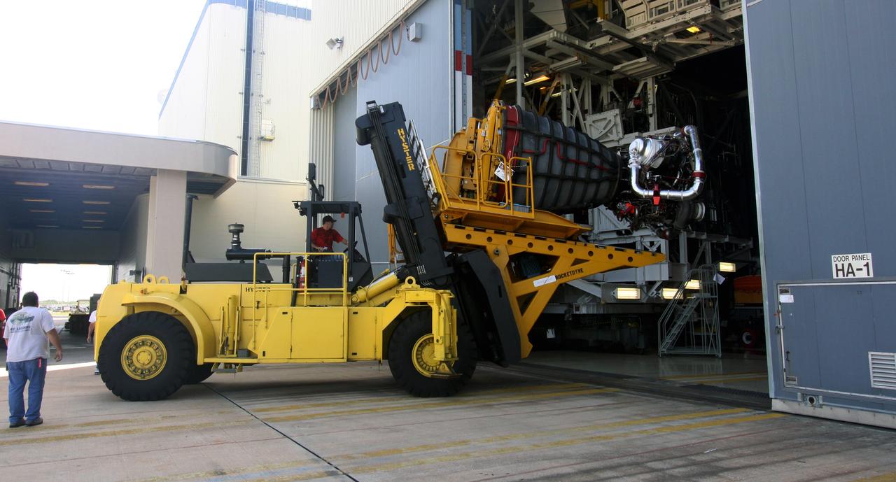 CAPE CANAVERAL, Fla. – At NASA's Kennedy Space Center in Florida, space shuttle Endeavour's main engine no. 2 is moved out of Orbiter Processing Bay 2 after removal from the shuttle. Engine removal is part of the post-landing processing. Endeavour returned from the STS-127 mission July 31. Endeavour's next mission is STS-130 targeted for February 2010. Endeavour will deliver to the International Space Station the Tranquility pressurized module that will provide room for many of the station's life support systems. Photo credit: NASA/Jack Pfaller
