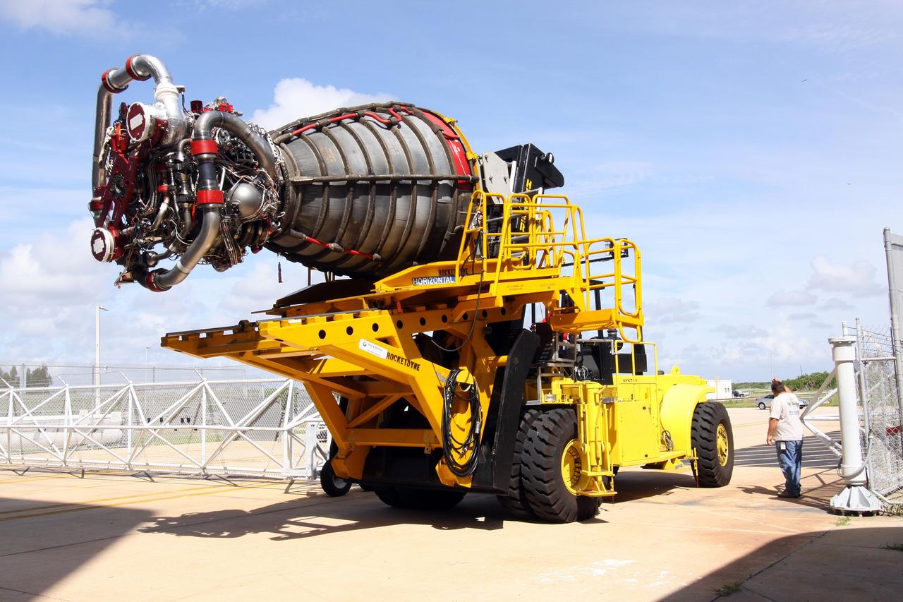 CAPE CANAVERAL, Fla. – At NASA's Kennedy Space Center in Florida, space shuttle Endeavour's main engine no. 2 is moved away from Orbiter Processing Bay 2 after removal from the shuttle. Engine removal is part of the post-landing processing. Endeavour returned from the STS-127 mission July 31. Endeavour's next mission is STS-130 targeted for February 2010. Endeavour will deliver to the International Space Station the Tranquility pressurized module that will provide room for many of the station's life support systems. Photo credit: NASA/Jack Pfaller