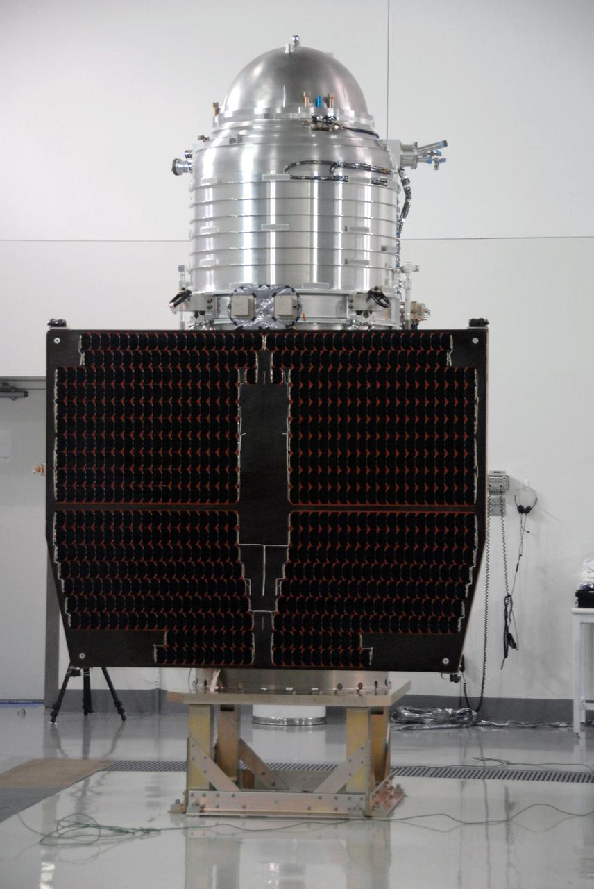 VANDENBERG AIR FORCE BASE, Calif. -- At Vandenberg Air Force Base's Astrotech processing facility in California, NASA's Wide-field Infrared Survey Explorer, or WISE, spacecraft is situated on a work stand. In front is the fixed panel solar array. The satellite will survey the entire sky at infrared wavelengths, creating a cosmic clearinghouse of hundreds of millions of objects, which will be catalogued, providing a vast storehouse of knowledge about the solar system, the Milky Way, and the universe. Launch is scheduled no earlier than Dec. 10. Photo credit: NASA/Moore, VAFB