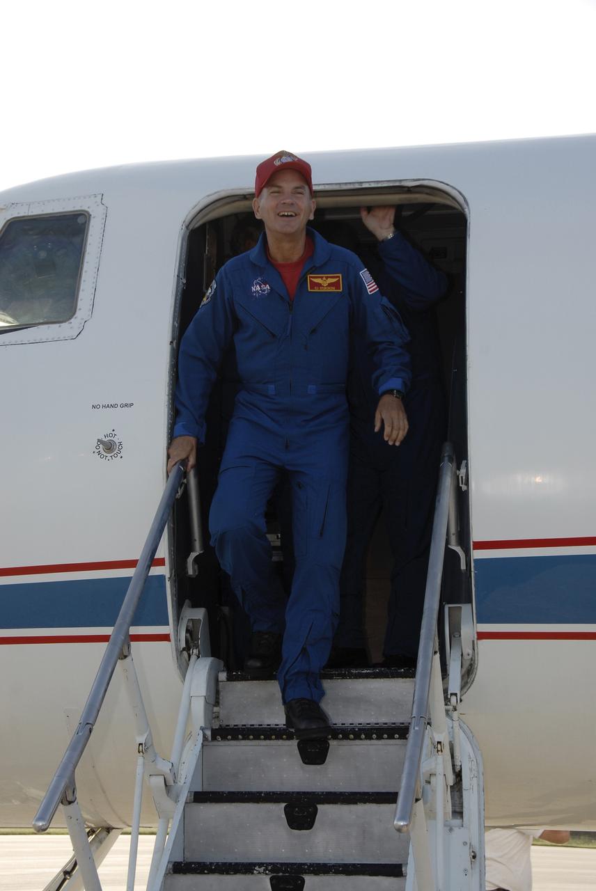 CAPE CANAVERAL, Fla. – The astronauts for space shuttle Discovery’s STS-128 mission arrive at Kennedy Space Center’s Shuttle Landing Facility at 6:34 p.m. EDT in a NASA Shuttle Training Aircraft. Here, Commander Rick Sturckow disembarks from the modified Gulfstream II jet. Sturckow is making his fourth spaceflight.   The crew has returned to Kennedy to prepare for launch on Aug. 25 at 1:36 a.m. EDT. The 13-day mission will deliver a new crew member and 33,000 pounds of equipment to the International Space Station. The equipment includes science and storage racks, a freezer to store research samples, a new sleeping compartment and the COLBERT treadmill.  Photo credit: NASA/Kim Shiflett