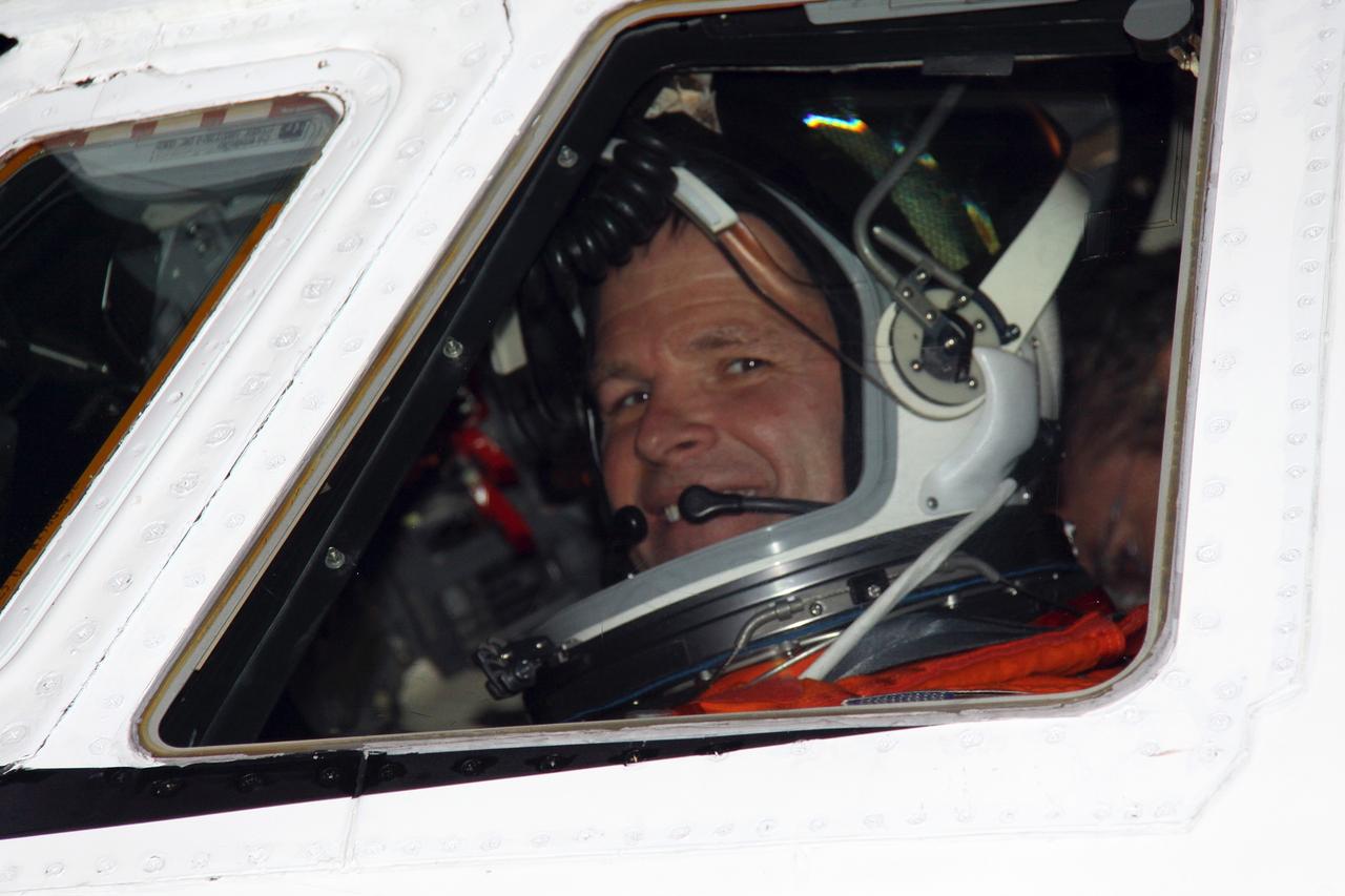 CAPE CANAVERAL, Fla. – STS-128 Pilot Kevin Ford sits in the Shuttle Training Aircraft cockpit at NASA Kennedy Space Center's Shuttle Landing Facility. Ford and Commander Rick Sturckow are ready to practice shuttle landings as preparation for space shuttle Discovery's launch Aug. 25 on the STS-128 mission. The 13-day mission will deliver a new crew member and 33,000 pounds of equipment to the International Space Station. The equipment includes science and storage racks, a freezer to store research samples, a new sleeping compartment and the COLBERT treadmill. Photo credit: NASA/Troy Cryder