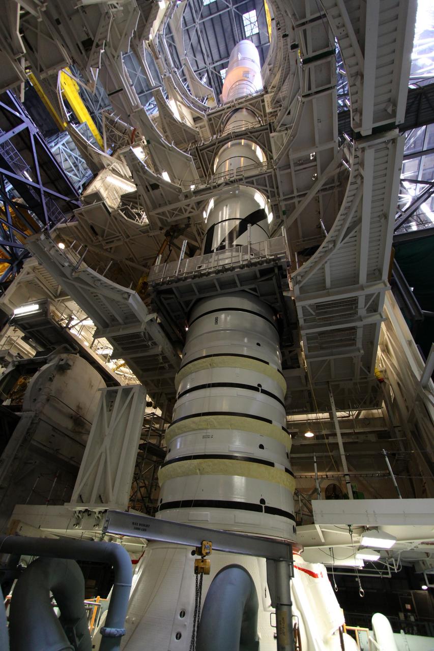 CAPE CANAVERAL, Fla. – Platforms surround the 327-foot tall Ares I-X rocket in NASA Kennedy Space Center's Vehicle Assembly Building. . The rocket is stacked on the mobile launcher platform in High Bay 3. Five super stacks make up the upper stage that are integrated with the four-segment solid rocket booster first stage below. Ares I-X is the test vehicle for the Ares I, which is part of the Constellation Program to return men to the moon and beyond. The Ares I-X flight test is targeted for Oct. 31. Photo credit: NASA/Jack Pfaller