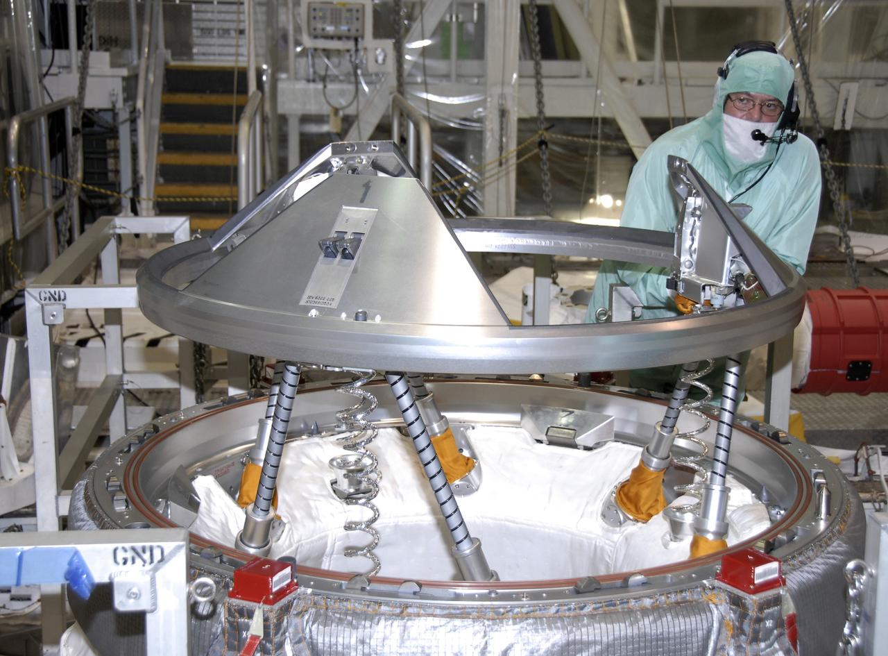 CAPE CANAVERAL, Fla. – In NASA Kennedy Space Center's Orbiter Processing Facility 1, technicians begin a functional test on the orbital docking system on space shuttle Atlantis. The STS-129 mission will deliver to the International Space Station two spare gyroscopes, two nitrogen tank assemblies, two pump modules, an ammonia tank assembly and a spare latching end effector for the station's robotic arm. STS-129 is targeted to launch Nov. 12. Photo credit: NASA/Kim Shiflett
