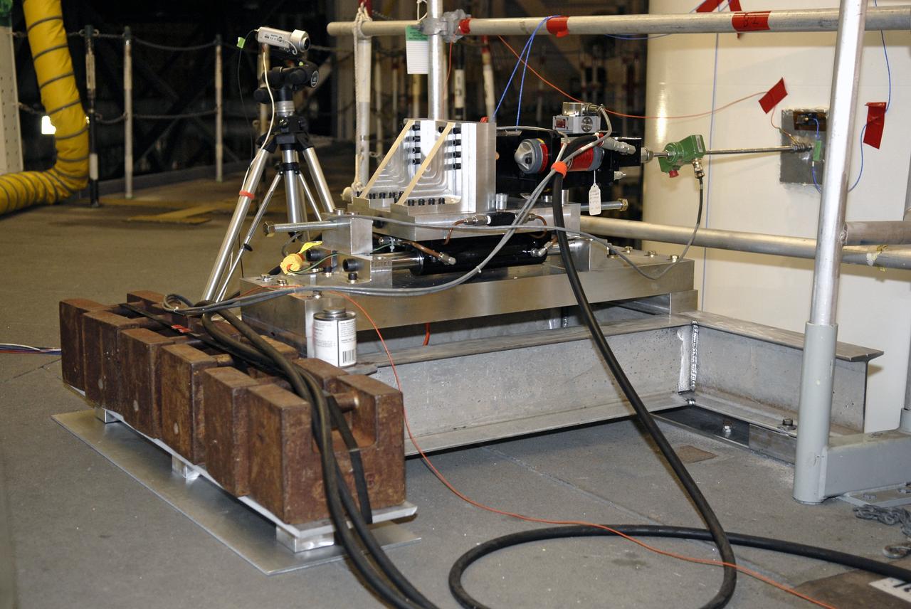 CAPE CANAVERAL, Fla. – In the Vehicle Assembly Building's High Bay 4 at NASA's Kennedy Space Center in Florida, equipment is set up to conduct a sway test on the Ares I-X launch vehicle. The test will simulate conditions the rocket could experience during rollout to Launch Pad 39B, wind conditions at the pad and first-stage ignition. During the test, vibrations are mechanically induced into the rocket by four hydraulic shakers and a sway is manually introduced for lateral motion to measure the vehicle's response. A total of 44 accelerometers are installed on the flight test vehicle that required more than 27,000 feet of cable. Part of the Constellation Program, the Ares I-X is the test vehicle for the Ares I, which is the essential core of a space transportation system that eventually will carry crewed missions back to the moon, on to Mars and out into the solar system . The Ares I-X flight test is targeted for Oct. 31. Photo credit: NASA/Kim Shiflett