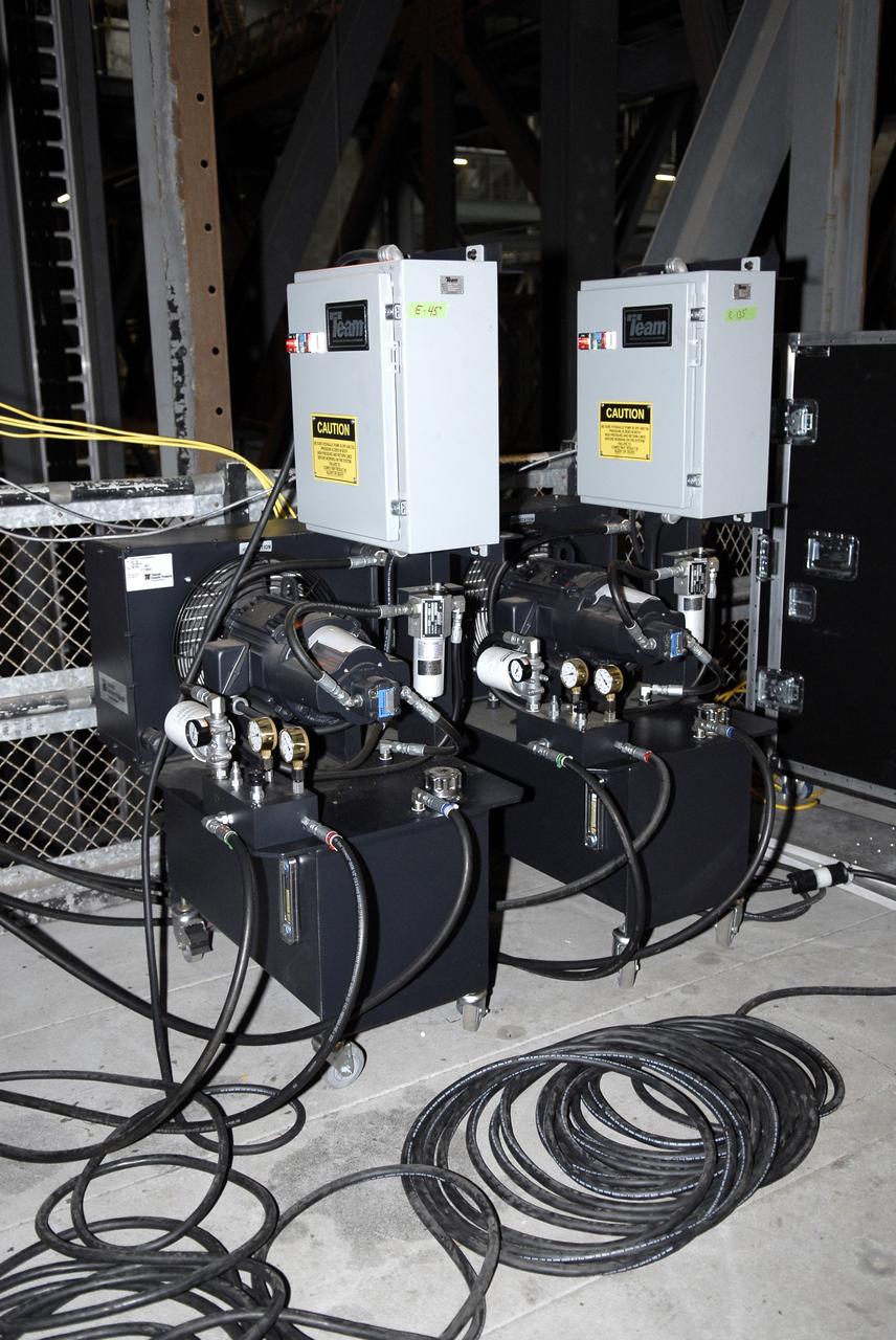 CAPE CANAVERAL, Fla. – In the Vehicle Assembly Building's High Bay 4 at NASA's Kennedy Space Center in Florida, equipment is set up to conduct a sway test on the Ares I-X launch vehicle. The test is simulating conditions the rocket could experience during rollout to Launch Pad 39B, wind conditions at the pad and first-stage ignition. During the test, vibrations are mechanically induced into the rocket by four hydraulic shakers and a sway is manually introduced for lateral motion to measure the vehicle's response. A total of 44 accelerometers are installed on the flight test vehicle that required more than 27,000 feet of cable. Part of the Constellation Program, the Ares I-X is the test vehicle for the Ares I, which is the essential core of a space transportation system that eventually will carry crewed missions back to the moon, on to Mars and out into the solar system . The Ares I-X flight test is targeted for Oct. 31. Photo credit: NASA/Kim Shiflett