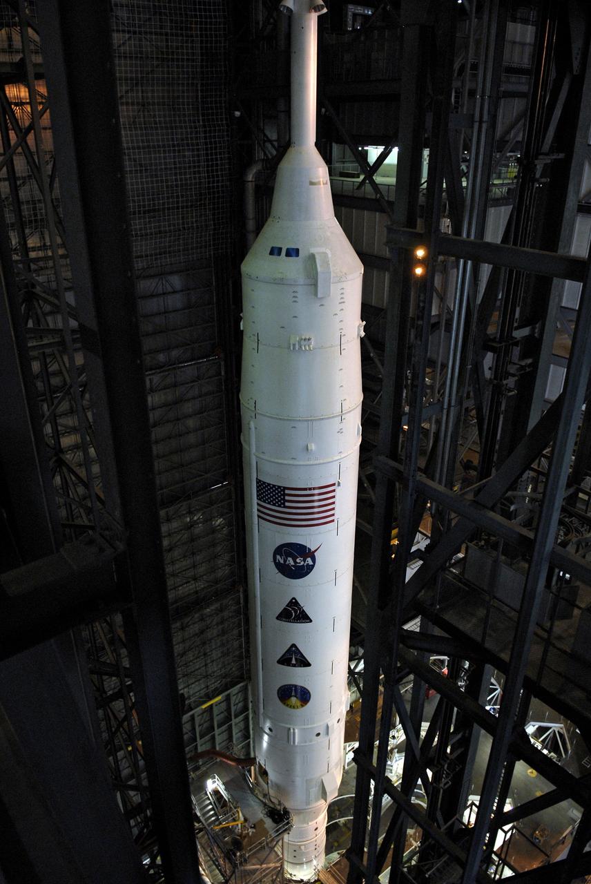 CAPE CANAVERAL, Fla. – This view captures the 327-foot height of the Ares I-X launch vehicle stacked in the Vehicle Assembly Building's High Bay 4 at NASA's Kennedy Space Center in Florida. The rocket is undergoing a sway test. The test is simulating conditions the rocket could experience during rollout to Launch Pad 39B, wind conditions at the pad and first-stage ignition. During the test, vibrations are mechanically induced into the rocket by four hydraulic shakers and a sway is manually introduced for lateral motion to measure the vehicle's response. A total of 44 accelerometers are installed on the flight test vehicle that required more than 27,000 feet of cable. Part of the Constellation Program, the Ares I-X is the test vehicle for the Ares I, which is the essential core of a space transportation system that eventually will carry crewed missions back to the moon, on to Mars and out into the solar system . The Ares I-X flight test is targeted for Oct. 31. Photo credit: NASA/Kim Shiflett