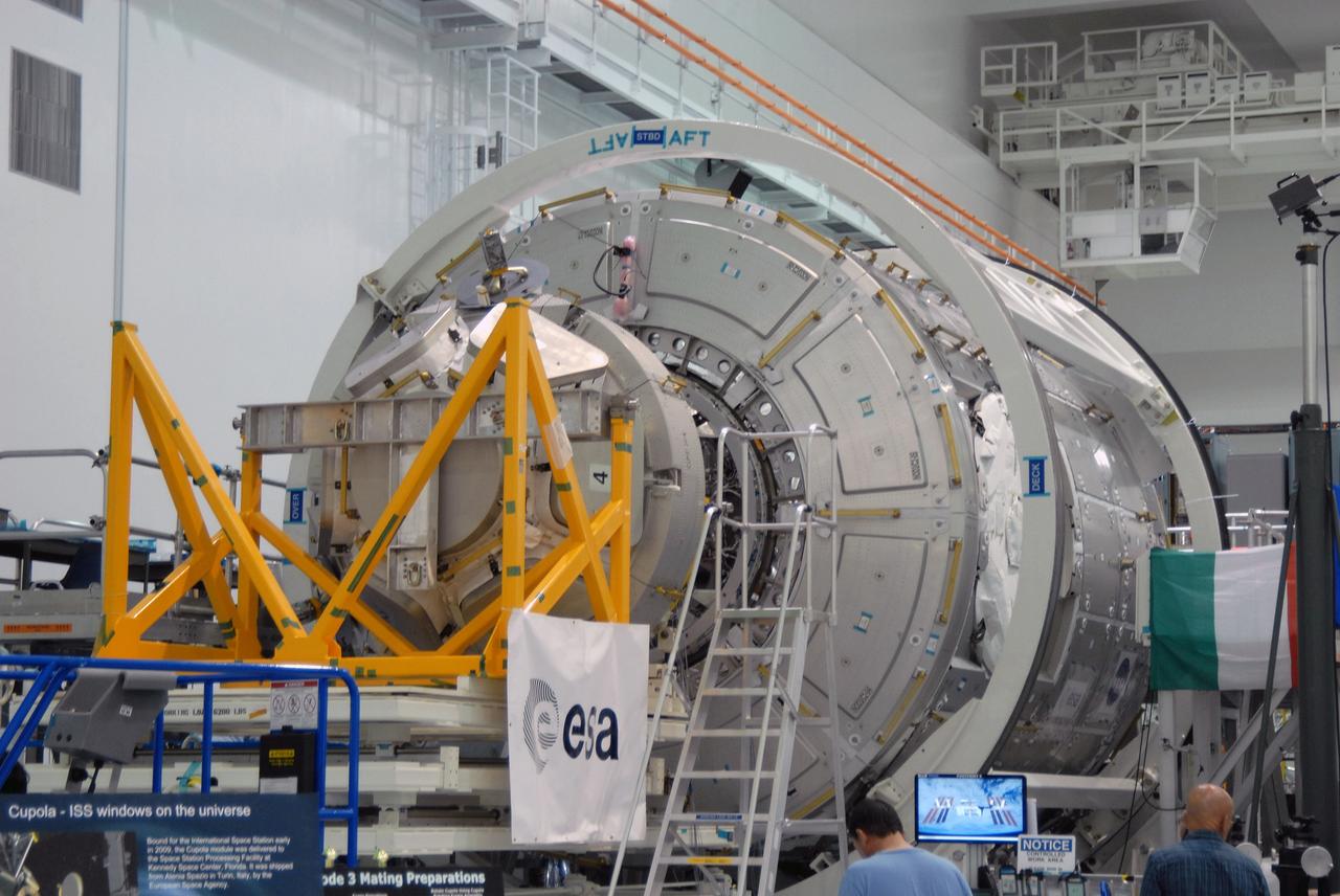 CAPE CANAVERAL, Fla. – In the Space Station Processing Facility at NASA's Kennedy Space Center in Florida,  NASA's Cupola module is being aligned with the Tranquility module for assembly.  Cupola and Tranquility are the payload for space shuttle Endeavour's STS-130 mission to the International Space Station.  The module was built for the European Space Agency by Alenia Spazio in Turin, Italy. When attached to the Tranquility Node 3 module, Cupola will resemble a circular bay window that will provide a vastly improved view of the station's exterior. Just under 10 feet in diameter, the module will accommodate two crew members and portable workstations that can control station and robotic activities. The multi-directional view will allow the crew to monitor spacewalks and docking operations, as well as provide a spectacular view of Earth and other celestial objects.  Endeavour is targeted to launch Feb. 4, 2010.  Photo credit: NASA/Jim Grossmann