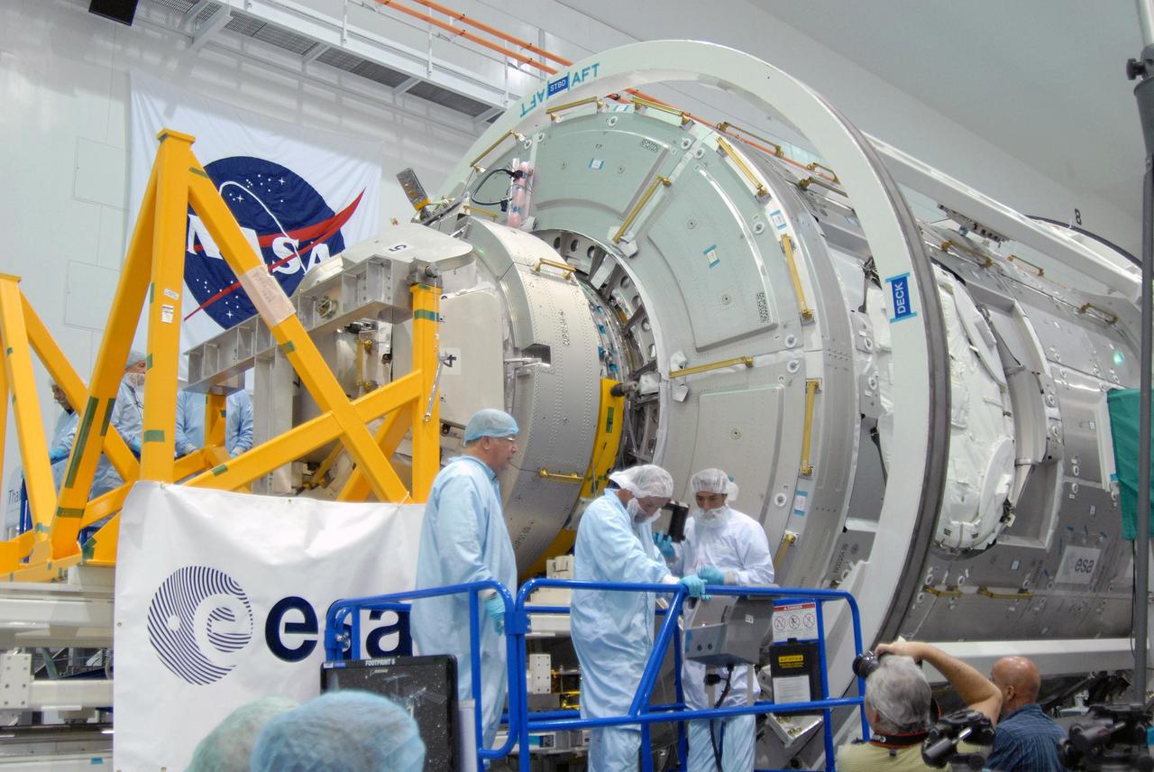 CAPE CANAVERAL, Fla. – In NASA Kennedy Space Center's Space Station Processing Facility,  the Cupola module is being mated to the Tranquility node on the work stand.  Cupola and Tranquility are the payload for space shuttle Endeavour's STS-130 mission to the International Space Station.  The module was built for the European Space Agency by Alenia Spazio in Turin, Italy. When attached to the Tranquility Node 3 module, Cupola will resemble a circular bay window that will provide a vastly improved view of the station's exterior. Just under 10 feet in diameter, the module will accommodate two crew members and portable workstations that can control station and robotic activities. The multi-directional view will allow the crew to monitor spacewalks and docking operations, as well as provide a spectacular view of Earth and other celestial objects.  Endeavour is targeted to launch Feb. 4, 2010.   Photo credit: NASA/Cory Huston