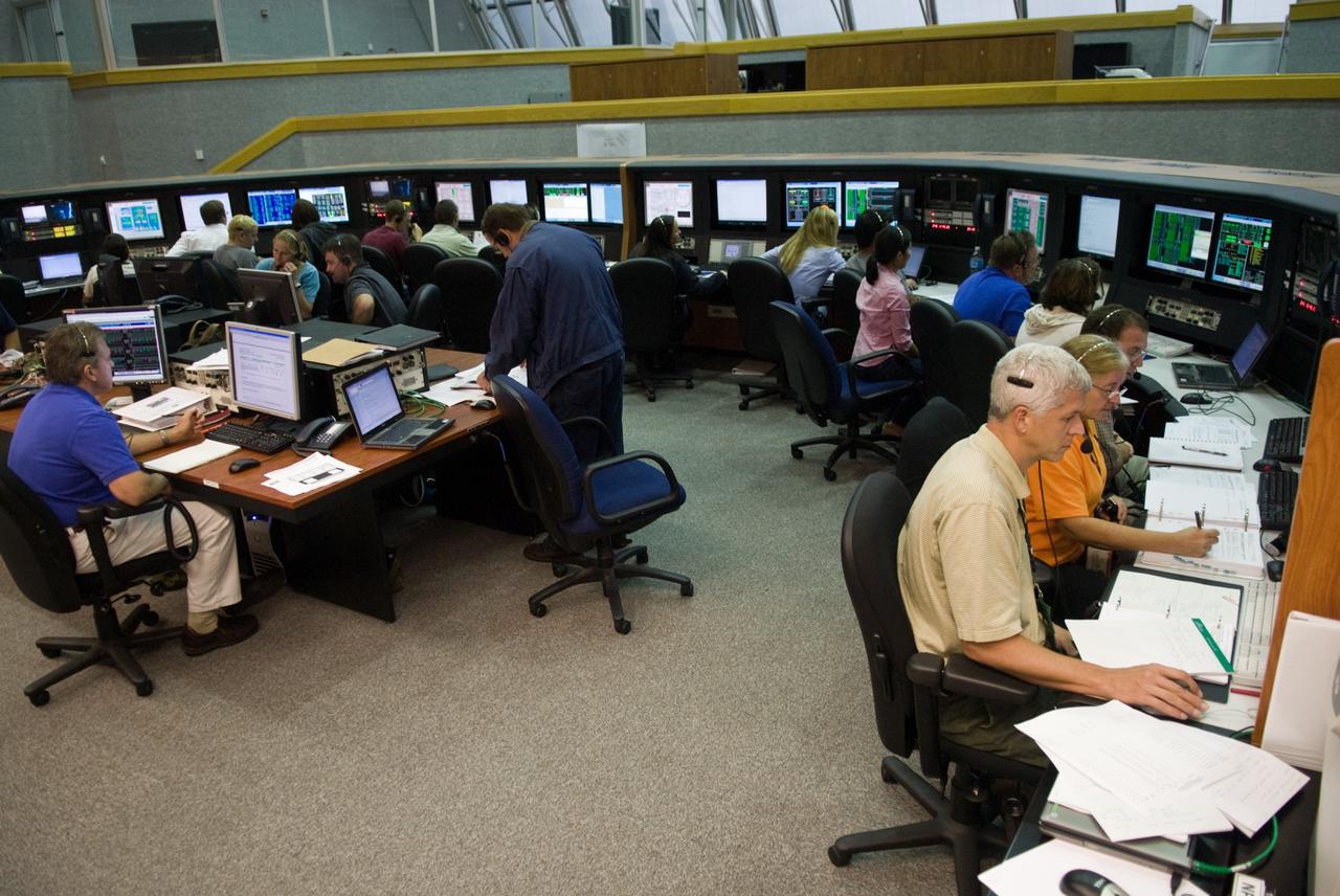 CAPE CANAVERAL, Fla. – In Firing Room 1 at NASA's Kennedy Space Center in Florida, mission engineers  take part in a countdown simulation for the upcoming Ares I-X flight test.  The test vehicle for the Ares I, Ares I-X is targeted for the  test on Oct. 31. Photo credit: NASA/Kim Shiflett