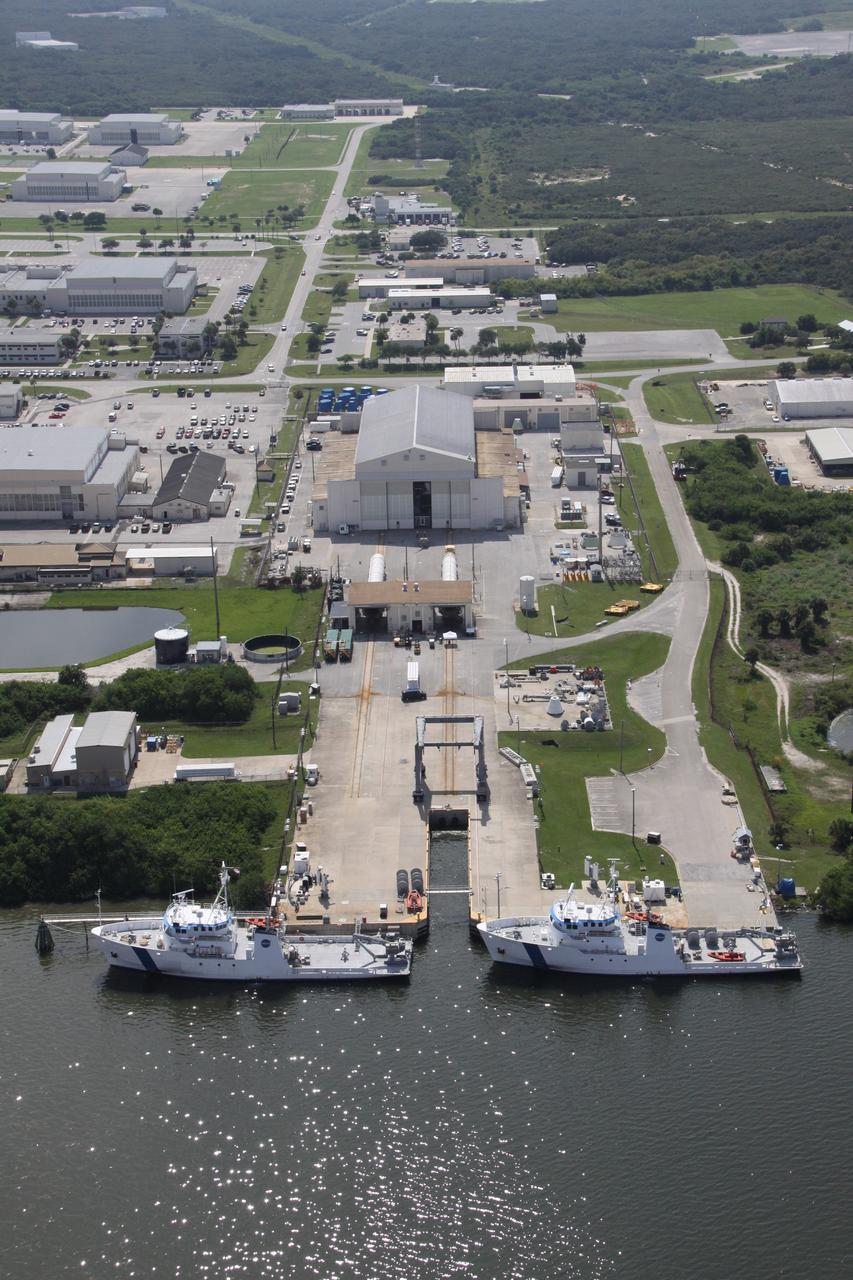 CAPE CANAVERAL, Fla. – An aerial view of the Solid Rocket Booster Recovery Ships Liberty Star and Freedom Star at Cape Canaveral Air Force Station's Hangar AF. The ships recently returned from recovering the boosters from space shuttle Discovery's launch on the STS-128 mission. Photo credit: NASA/Troy Cryder