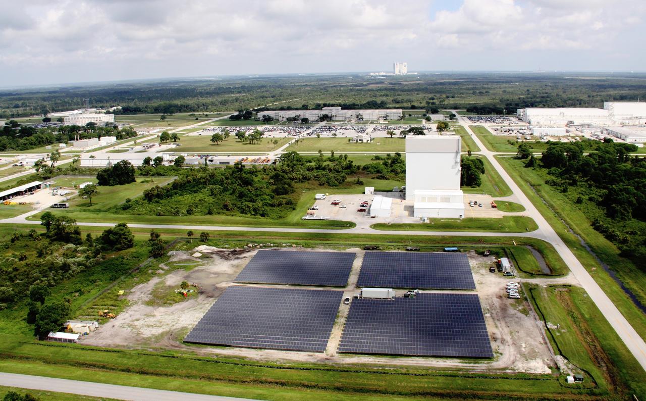 CAPE CANAVERAL, Fla. – An aerial view of the site in the Industrial Area of NASA's Kennedy Space Center in Florida where a solar power system is being built. The solar power systems are being constructed by NASA and Florida Power & Light Company as part of a public-private partnership that promotes a clean-energy future.  This site located on 10 acres will produce about one megawatt of electricity for Kennedy to use.  Photo credit: NASA/Troy Cryder