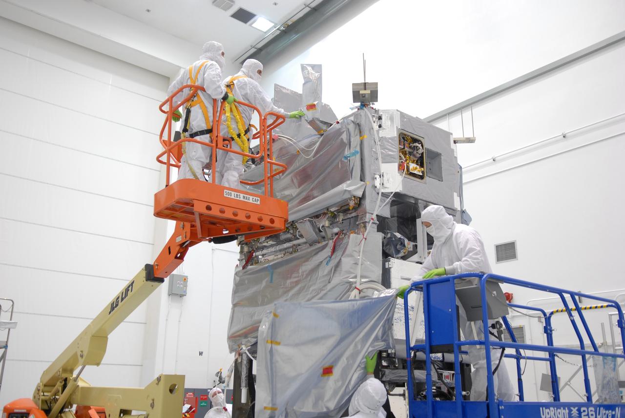 CAPE CANAVERAL, Fla. –At the Astrotech payload processing facility in Titusville, Fla., the mated SV1 and SV2 spacecraft are being prepared for center of gravity testing, weighing and balancing.  The two spacecraft are known as the Space Tracking and Surveillance System – Demonstrators, or STSS Demo, which is a space-based sensor component of a layered Ballistic Missile Defense System designed for the overall mission of detecting, tracking and discriminating ballistic missiles.  STSS is capable of tracking objects after boost phase and provides trajectory information to other sensors. It will be launched by NASA for the Missile Defense Agency between 8 and 8:58 a.m. EDT Sept. 18.  Approved for Public Release 09-MDA-04886 (10 SEPT 09) Photo credit: NASA/Jim Grossmann