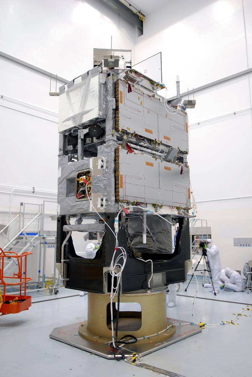 CAPE CANAVERAL, Fla. –  At the Astrotech payload processing facility in Titusville, Fla., the mated SV1 and SV2 spacecraft are on a rotation stand for center of gravity testing, weighing and balancing.   The two spacecraft are known as the Space Tracking and Surveillance System – Demonstrators, or STSS Demo, which is a space-based sensor component of a layered Ballistic Missile Defense System designed for the overall mission of detecting, tracking and discriminating ballistic missiles.  STSS is capable of tracking objects after boost phase and provides trajectory information to other sensors. It will be launched by NASA for the Missile Defense Agency between 8 and 8:58 a.m. EDT Sept. 18.  Approved for Public Release 09-MDA-04886 (10 SEPT 09) Photo credit: NASA/Jim Grossmann