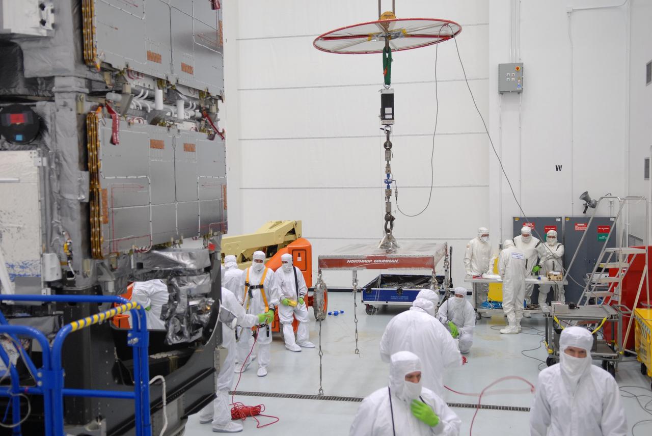 CAPE CANAVERAL, Fla. –  At the Astrotech payload processing facility in Titusville, Fla., an overhead crane with a scale is being moved to attach to the SV1-SV2 spacecraft, which will be weighed.  The two spacecraft are known as the Space Tracking and Surveillance System – Demonstrators, or STSS Demo, which is a space-based sensor component of a layered Ballistic Missile Defense System designed for the overall mission of detecting, tracking and discriminating ballistic missiles.  STSS is capable of tracking objects after boost phase and provides trajectory information to other sensors. It will be launched by NASA for the Missile Defense Agency between 8 and 8:58 a.m. EDT Sept. 18.  Approved for Public Release 09-MDA-04886 (10 SEPT 09) Photo credit: NASA/Jim Grossmann