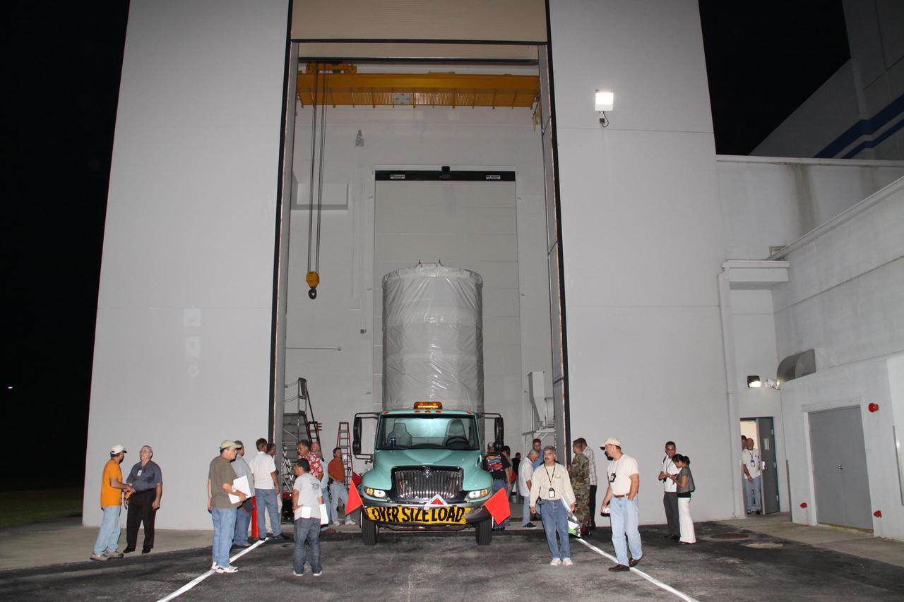 CAPE CANAVERAL, Fla. – The enclosed Space Tracking and Surveillance System – Demonstrators, or STSS-Demo, spacecraft moves out of the Astrotech payload processing facility.  It is being moved to Cape Canaveral Air Force Station's Launch Pad 17-B. The STSS Demo is a space-based sensor component of a layered Ballistic Missile Defense System designed for the overall mission of detecting, tracking and discriminating ballistic missiles.  STSS is capable of tracking objects after boost phase and provides trajectory information to other sensors. It will be launched by NASA for the Missile Defense Agency between 8 and 8:58 a.m. EDT Sept. 18.  Approved for Public Release 09-MDA-04886 (10 SEPT 09) Photo credit: NASA/Jack Pfaller