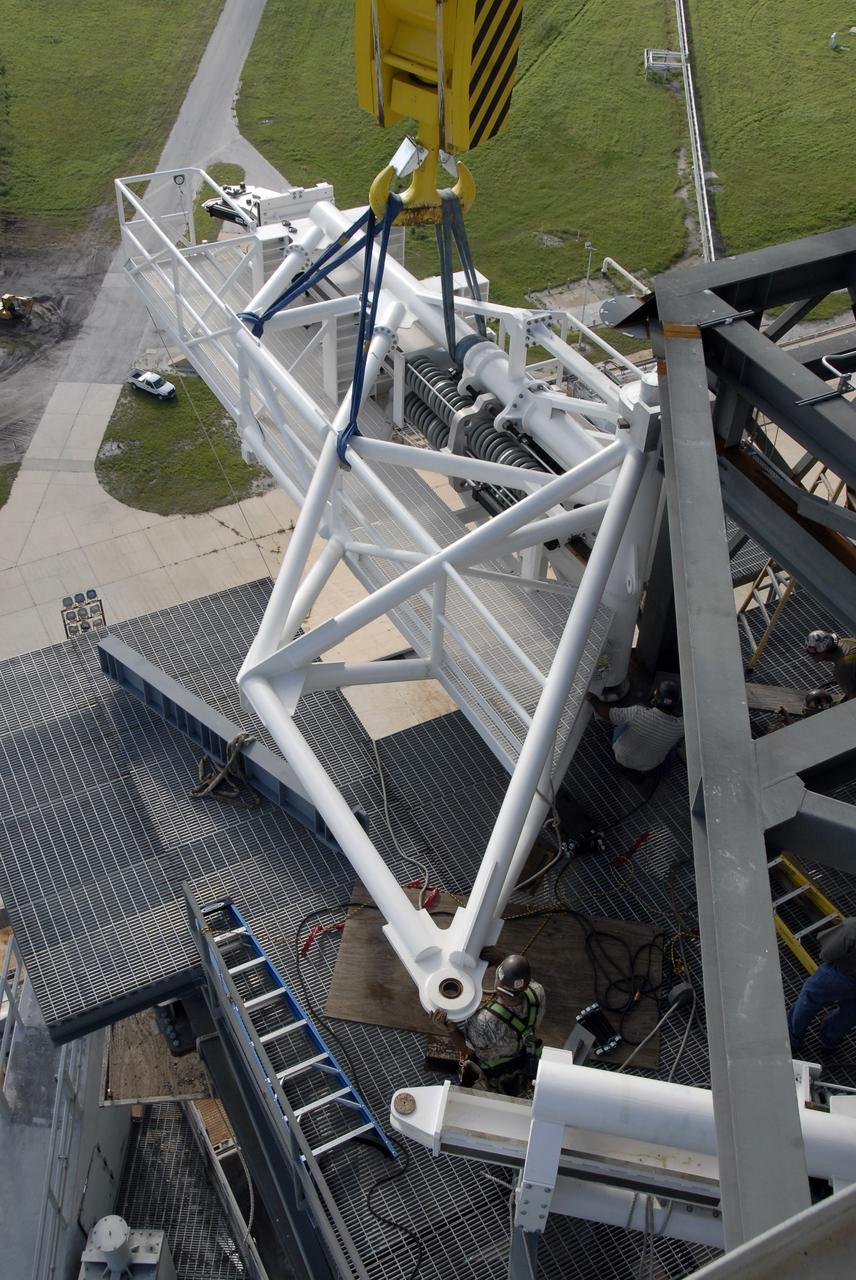 CAPE CANAVERAL, Fla. – On NASA Kennedy Space Center's Launch Pad 39B, the stabilizing arm is moved into place on the fixed service structure for attachment. The arm will be used in the Ares I-X rocket launch, targeted for Oct. 31. Ares I-X is part of NASA's Constellation Program. Photo credit: NASA/Kim Shiflett