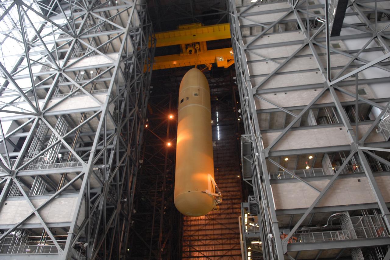 CAPE CANAVERAL, Fla. – The external fuel tank for space shuttle Atlantis' STS-129 mission is being moved from the checkout cell of NASA Kennedy Space Center's Vehicle Assembly Building to high bay 2 for assembly with the solid rocket boosters already stacked on the mobile launch platform. The STS-129 mission is targeted to launch Nov. 12 on an 11-day supply mission to the International Space Station. Photo credit: NASA/Jim Grossmann