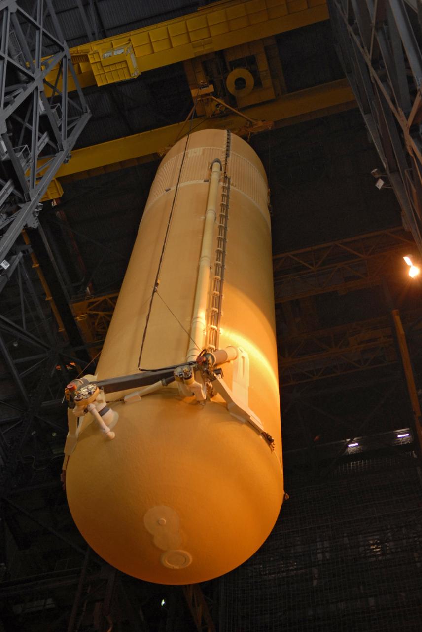 CAPE CANAVERAL, Fla. – The external fuel tank for space shuttle Atlantis' STS-129 mission is being moved from the checkout cell of NASA Kennedy Space Center's Vehicle Assembly Building to high bay 2 for assembly with the solid rocket boosters already stacked on the mobile launch platform. The STS-129 mission is targeted to launch Nov. 12 on an 11-day supply mission to the International Space Station. Photo credit: NASA/Jim Grossmann