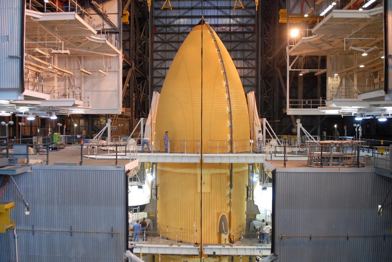 CAPE CANAVERAL, Fla. – In NASA Kennedy Space Center's Vehicle Assembly Building, work platforms surround the external fuel tank for space shuttle Atlantis' STS-129 mission. The tank has been lowered onto the mobile launch platform for assembly with the solid rocket boosters stacked there. The STS-129 mission is targeted to launch Nov. 12 on an 11-day supply mission to the International Space Station. Photo credit: NASA/Jim Grossmann