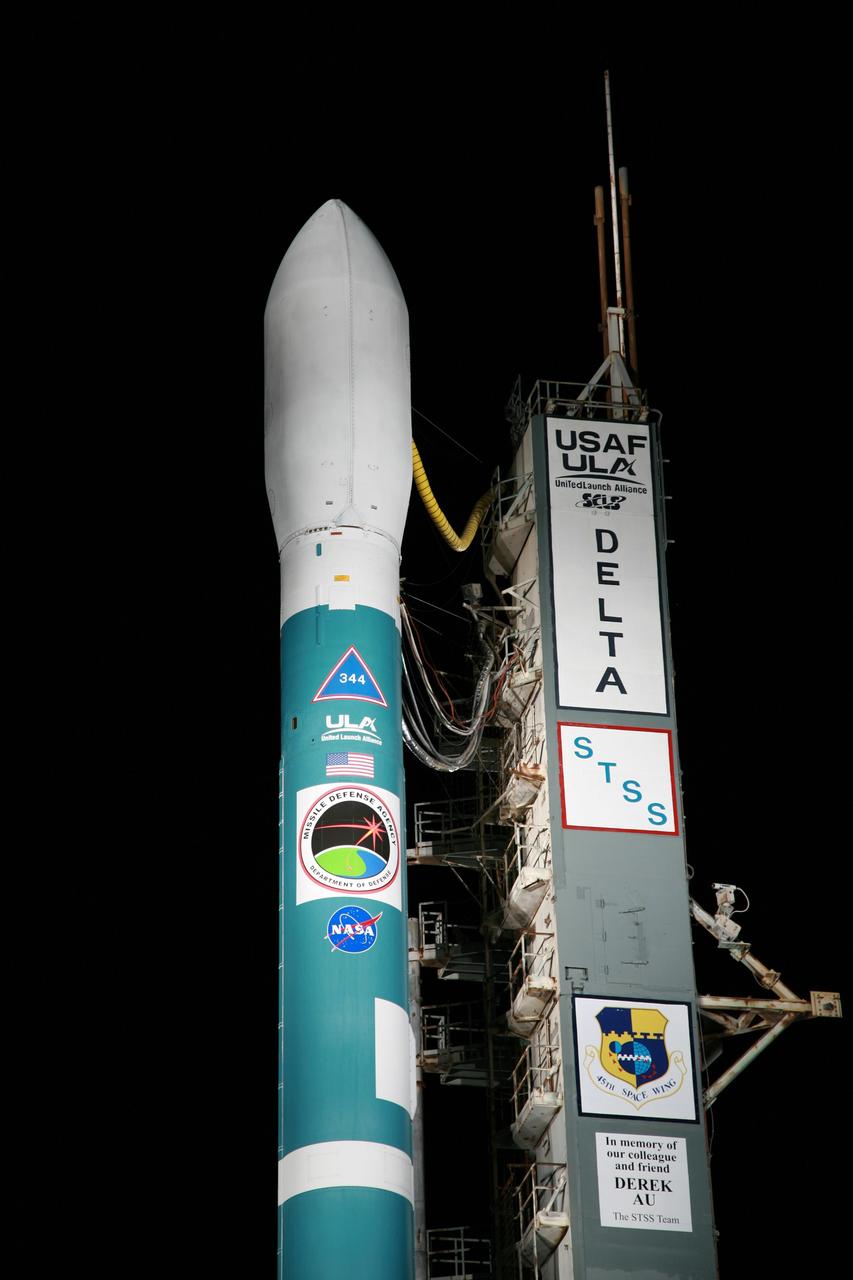 CAPE CANAVERAL, Fla. – The mobile service tower on Launch Pad 17-B at Cape Canaveral Air Force Station has been rolled back to reveal the United Launch Alliance Delta II rocket that will launch the Space Tracking and Surveillance System - Demonstrator into orbit. It is being launched by NASA for the Missile Defense System. The hour-long launch window opens at 8 a.m. EDT today.    The STSS Demo is a space-based sensor component of a layered Ballistic Missile Defense System designed for the overall mission of detecting, tracking and discriminating ballistic missiles. STSS is capable of tracking objects after boost phase and provides trajectory information to other sensors. Photo credit: NASA/Dimitri Gerondidakis