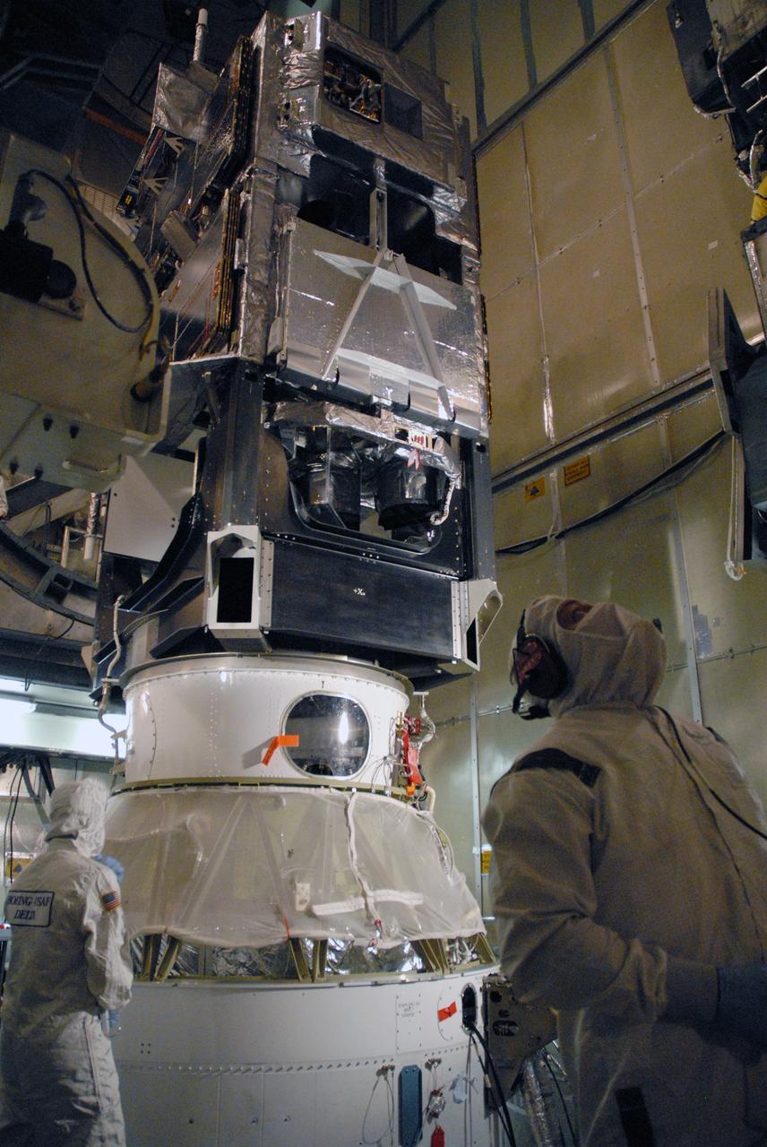 CAPE CANAVERAL, Fla. – Inside the mobile service tower on Launch Pad 17-B at Cape Canaveral Air Force Station in Florida, the Space Tracking and Surveillance System – Demonstrator spacecraft is waiting for encapsulation in the fairing.  The fairing is a two-part molded structure that fits flush with the outside surface of the rocket and forms an aerodynamically smooth nose cone, protecting the spacecraft during launch and ascent.  STSS Demo is a space-based sensor component of a layered Ballistic Missile Defense System designed for the overall mission of detection, tracking and discriminating ballistic missiles.  STSS is capable of tracking objects after boost phase and provides trajectory information to other sensors. It will be launched by NASA for the Missile Defense Agency between 8 and 8:58 a.m. EDT Sept. 18. Approved for Public Release 09-MDA-4934 (09-22-09) Photo credit: NASA/Cory Huston