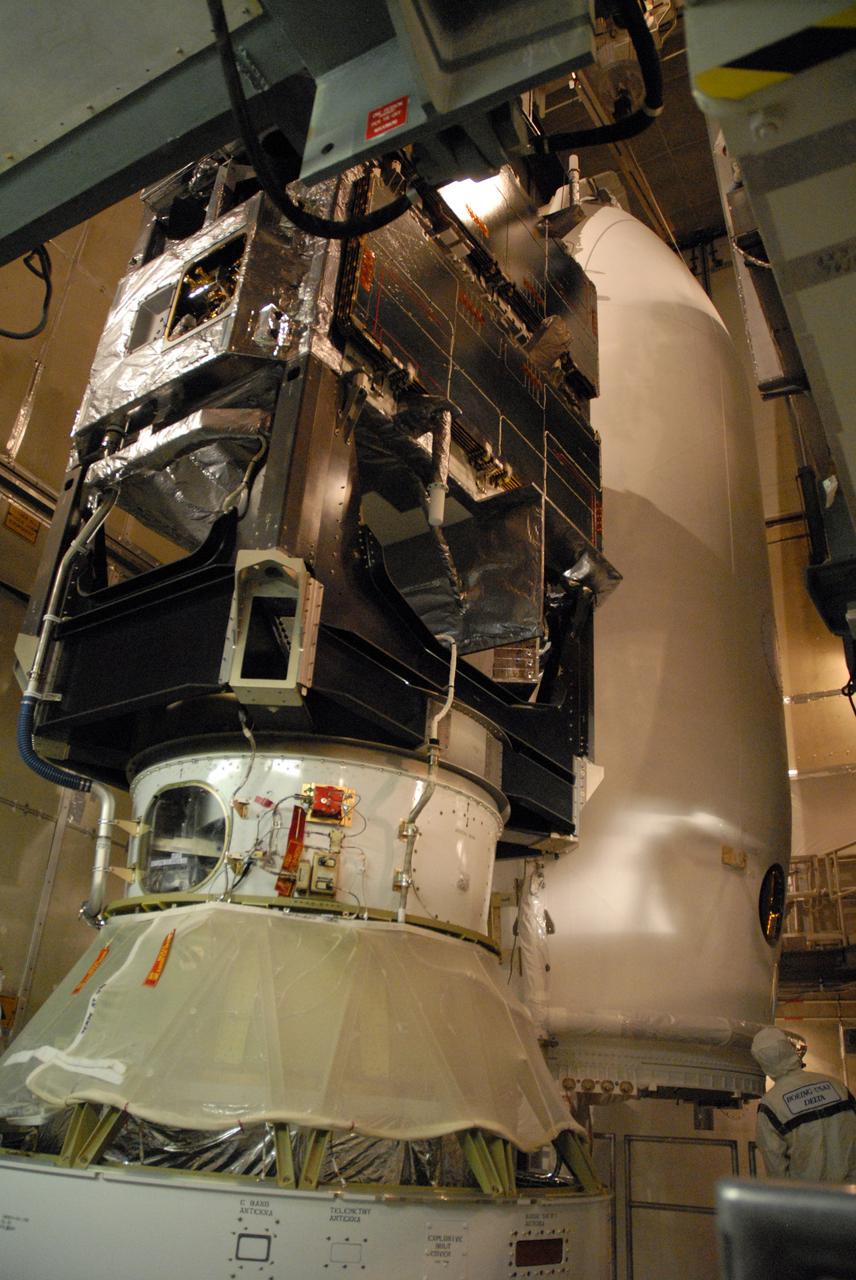 CAPE CANAVERAL, Fla. – Inside the mobile service tower on Launch Pad 17-B at Cape Canaveral Air Force Station in Florida, the Space Tracking and Surveillance System – Demonstrator spacecraft is waiting for encapsulation in the fairing, behind it. The fairing is a two-part molded structure that fits flush with the outside surface of the rocket and forms an aerodynamically smooth nose cone, protecting the spacecraft during launch and ascent.  STSS Demo is a space-based sensor component of a layered Ballistic Missile Defense System designed for the overall mission of detection, tracking and discriminating ballistic missiles.  STSS is capable of tracking objects after boost phase and provides trajectory information to other sensors. It will be launched by NASA for the Missile Defense Agency between 8 and 8:58 a.m. EDT Sept. 18. Approved for Public Release 09-MDA-4934 (09-22-09) Photo credit: NASA/Cory Huston