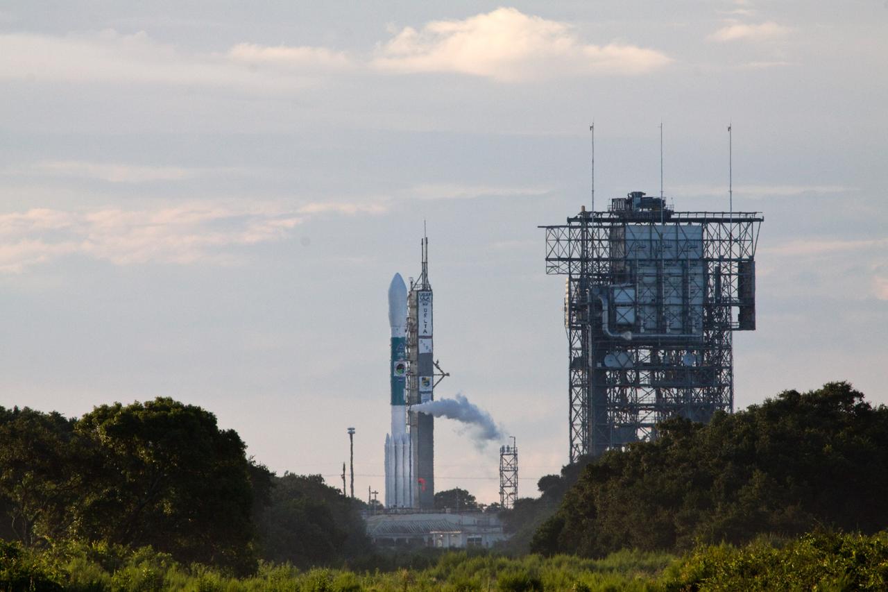 CAPE CANAVERAL, Fla. – Under a cloud-streaked sky, the Space Tracking and Surveillance System – Demonstrator, or STSS-Demo, waits through the countdown to liftoff Launch Pad 17-B at Cape Canaveral Air Force Station aboard a United Launch Alliance Delta II rocket.  STSS-Demo is being launched by NASA for the U.S. Missile Defense Agency.  Liftoff is at 8:20 a.m. EDT.  The STSS-Demo is a space-based sensor component of a layered Ballistic Missile Defense System designed for the overall mission of detecting, tracking and discriminating ballistic missiles. STSS is capable of tracking objects after boost phase and provides trajectory information to other sensors. Photo credit: NASA/Jack Pfaller