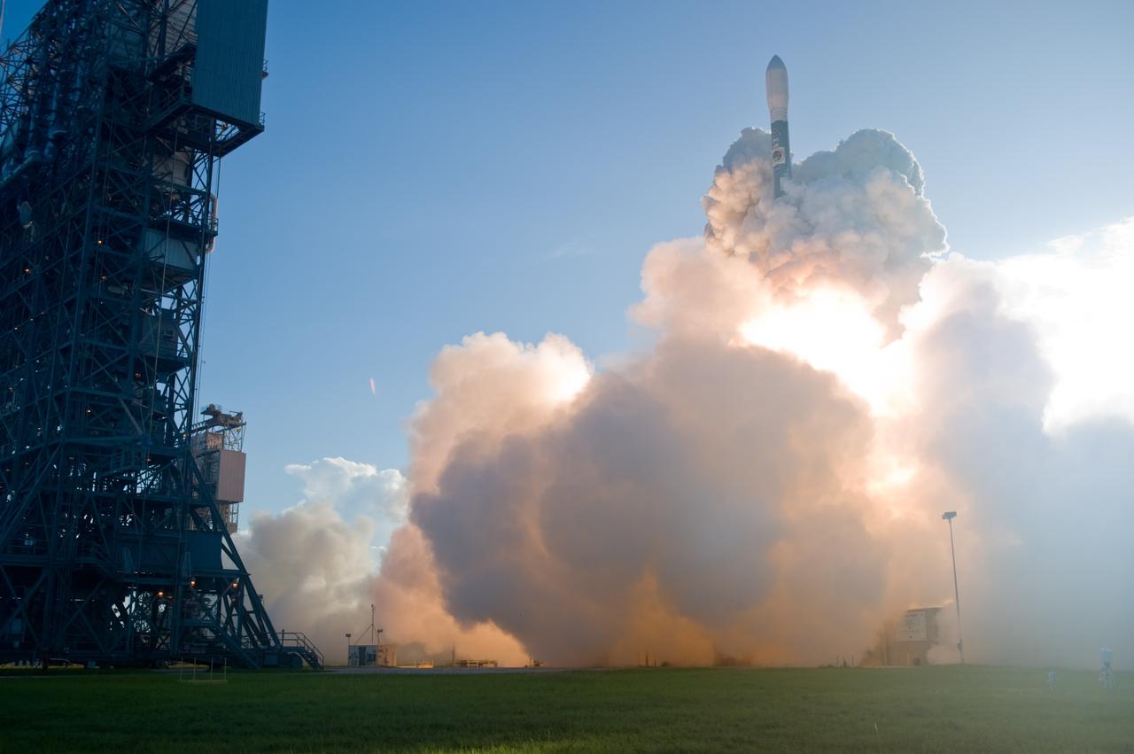 CAPE CANAVERAL, Fla. –  The United Launch Alliance Delta II rocket with Space Tracking and Surveillance System - Demonstrator, or STSS-Demo, spacecraft emerges from a blanket of smoke after liftoff from Launch Pad 17-B at Cape Canaveral Air Force Station.  STSS-Demo was launched at 8:20:22 a.m. EDT by NASA for the Missile Defense System.   The STSS-Demo is a space-based sensor component of a layered Ballistic Missile Defense System designed for the overall mission of detecting, tracking and discriminating ballistic missiles.  Photo credit: NASA/Tony Gray-Tim Powers