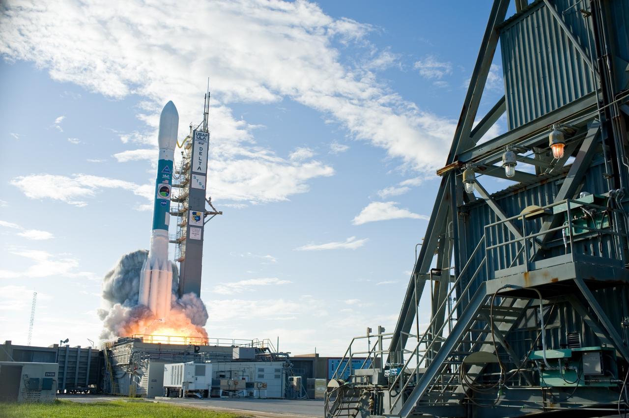 CAPE CANAVERAL, Fla. –  The Space Tracking and Surveillance System - Demonstrator, or STSS-Demo,  spacecraft lifts off through a cloud of smoke from Launch Pad 17-B at Cape Canaveral Air Force Station aboard a United Launch Alliance Delta II rocket. It was launched by NASA for the U.S. Missile Defense Agency. Launch was at 8:20:22 a.m. EDT.  The STSS-Demo is a space-based sensor component of a layered Ballistic Missile Defense System designed for the overall mission of detecting, tracking and discriminating ballistic missiles.  Photo credit: NASA/Regina Mitchell-Tom Farrar