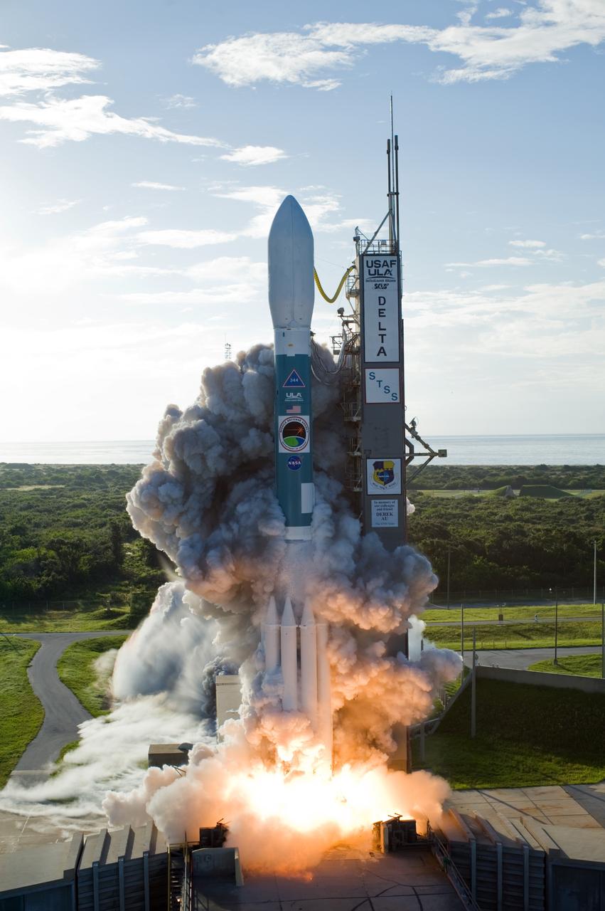 CAPE CANAVERAL, Fla. –  Smoke billows around the United Launch Alliance Delta II rocket as it launches into space carrying the Space Tracking and Surveillance System - Demonstrator, or STSS-Demo, spacecraft.  STSS-Demo was launched at 8:20:22 a.m. EDT by NASA for the U.S. Missile Defense Agency. The STSS-Demo is a space-based sensor component of a layered Ballistic Missile Defense System designed for the overall mission of detecting, tracking and discriminating ballistic missiles.  Photo credit: NASA/Regina Mitchell-Tom Farrar