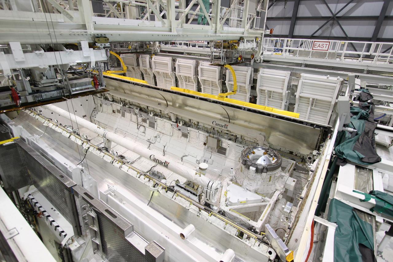 CAPE CANAVERAL, Fla. –  In Orbiter Processing Facility 1 at NASA's Kennedy Space Center in Florida, space shuttle Atlantis' payload bay doors are being closed.  The designated shuttle for the STS-129 mission, Atlantis will deliver to the International Space Station two spare gyroscopes, two nitrogen tank assemblies, two pump modules, an ammonia tank assembly and a spare latching end effector for the station's robotic arm. Atlantis is targeted to launch Nov. 12. Photo credit: NASA/Jack Pfaller