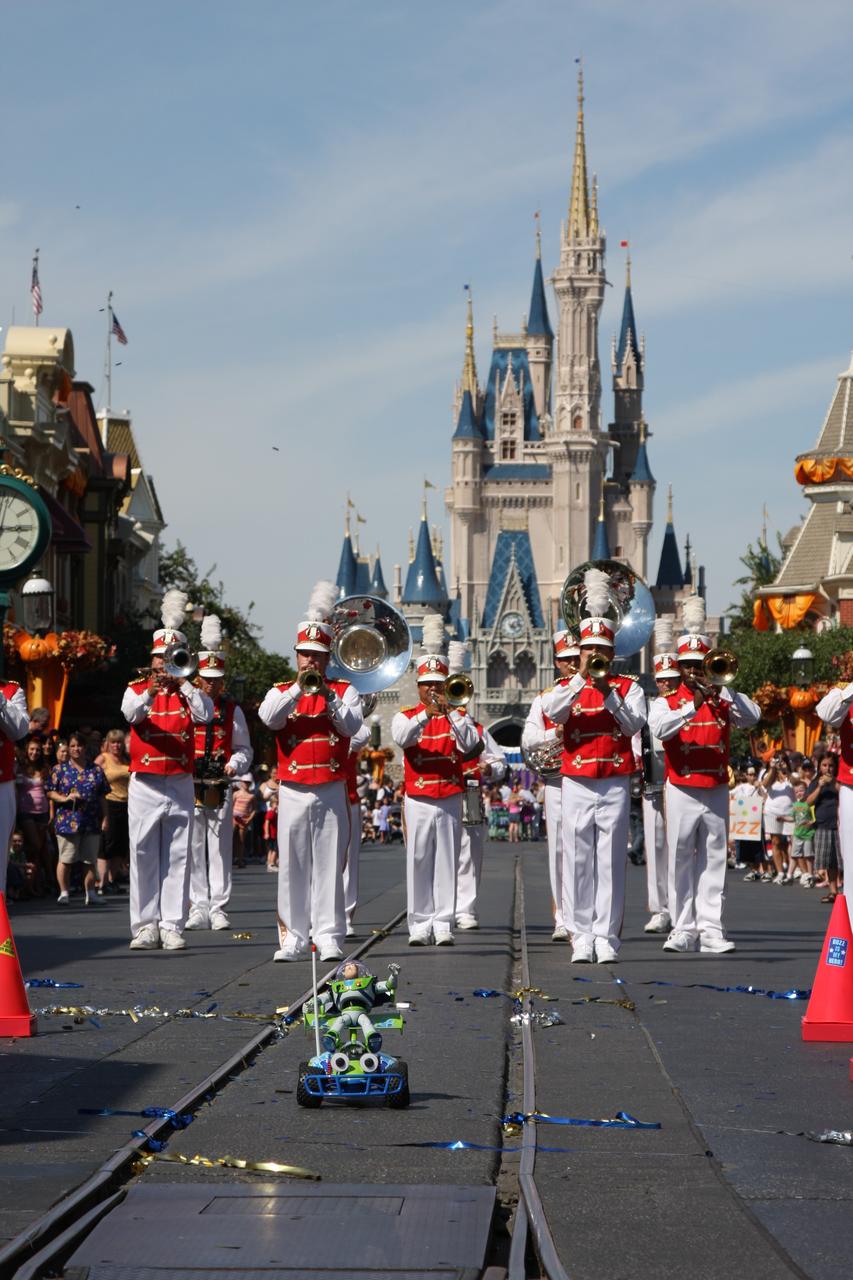 CAPE CANAVERAL, Fla. – At Walt Disney World's Magic Kingdom in Orlando, Fla., toy space ranger Buzz Lightyear participates in a ticker-tape parade to welcome him home from space.    The 12-inch-tall action figure spent more than 15 months aboard the International Space Station and returned to Earth aboard space shuttle Discovery on Sept. 11 with the STS-128 crew.  Lightyear's space adventure, a collaboration between NASA and Disney Parks, is intended to share the excitement of space exploration with students around the world and encourage them to pursue studies in science, technology, engineering and mathematics.  For additional information, visit http://www.nasa.gov/buzzoniss.  Photo credit: NASA/Dimitri Gerondidakis