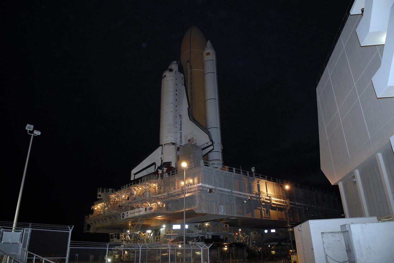 CAPE CANAVERAL, Fla. – At NASA's Kennedy Space Center in Florida, space shuttle Atlantis, secured to its mobile launcher platform, slowly rolls past the Launch Control Center. First motion out of the Vehicle Assembly Building was at 6:38 a.m. EDT Oct. 14. The 3.4-mile trip, known as rollout, is expected to take about six hours.    Liftoff of Atlantis on its STS-129 mission to the International Space Station is targeted for Nov. 12. For information on the STS-129 mission and crew, visit http://www.nasa.gov/mission_pages/shuttle/shuttlemissions/sts129/index.html. Photo credit: NASA/Kim Shiflett