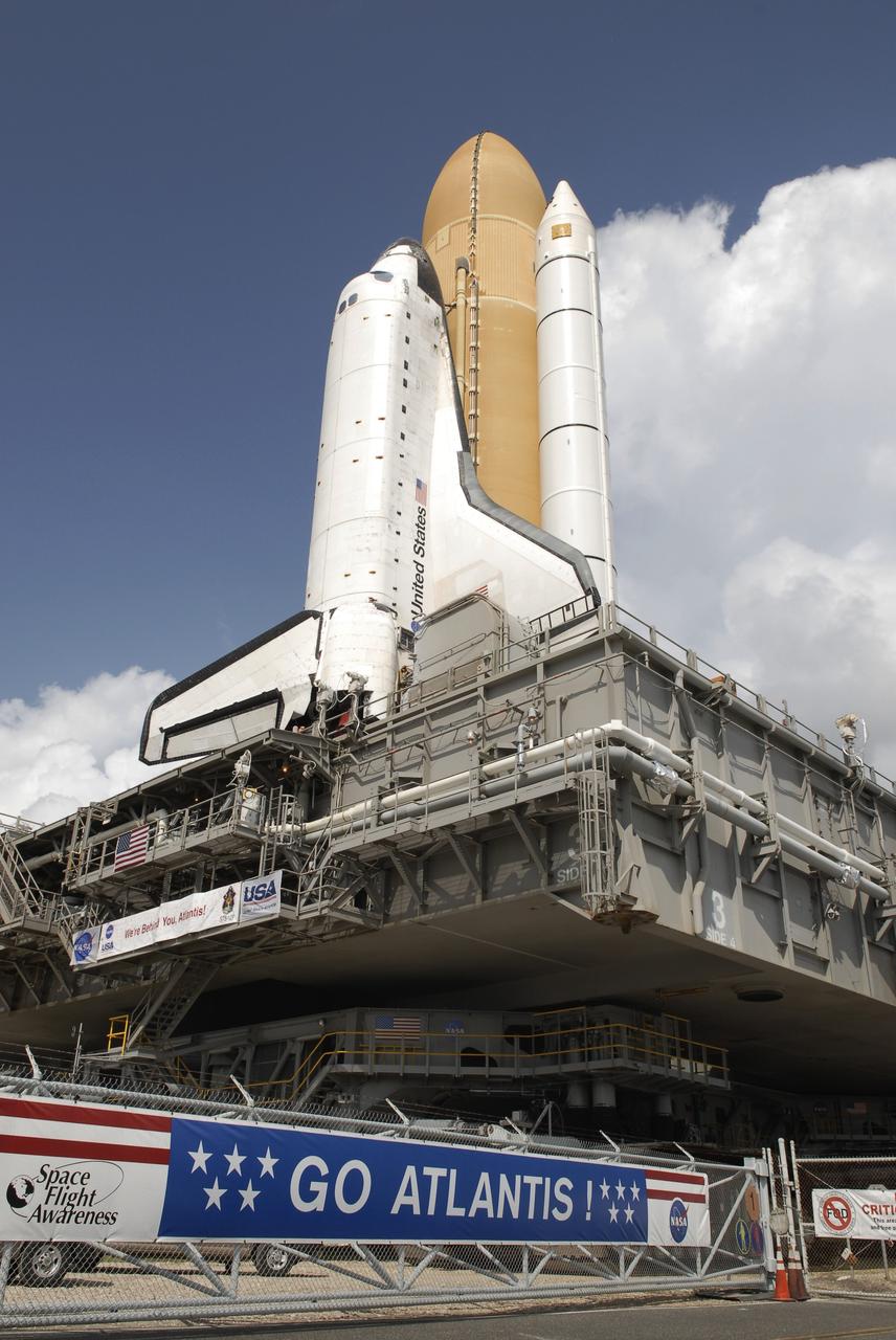 CAPE CANAVERAL, Fla. – At NASA's Kennedy Space Center in Florida, space shuttle Atlantis, attached to its external tank and solid rocket boosters atop a mobile launcher platform, arrives at Launch Complex 39A. First motion on the 3.4-mile trip from the Vehicle Assembly Building, known as rollout, was at 6:38 a.m. EDT Oct. 14. The rollout took about six hours, and the shuttle was secure on the pad at 1:31 p.m.    Liftoff of Atlantis on its STS-129 mission to the International Space Station is targeted for Nov. 12. For information on the STS-129 mission and crew, visit http://www.nasa.gov/mission_pages/shuttle/shuttlemissions/sts129/index.html. Photo credit: NASA/Kim Shiflett