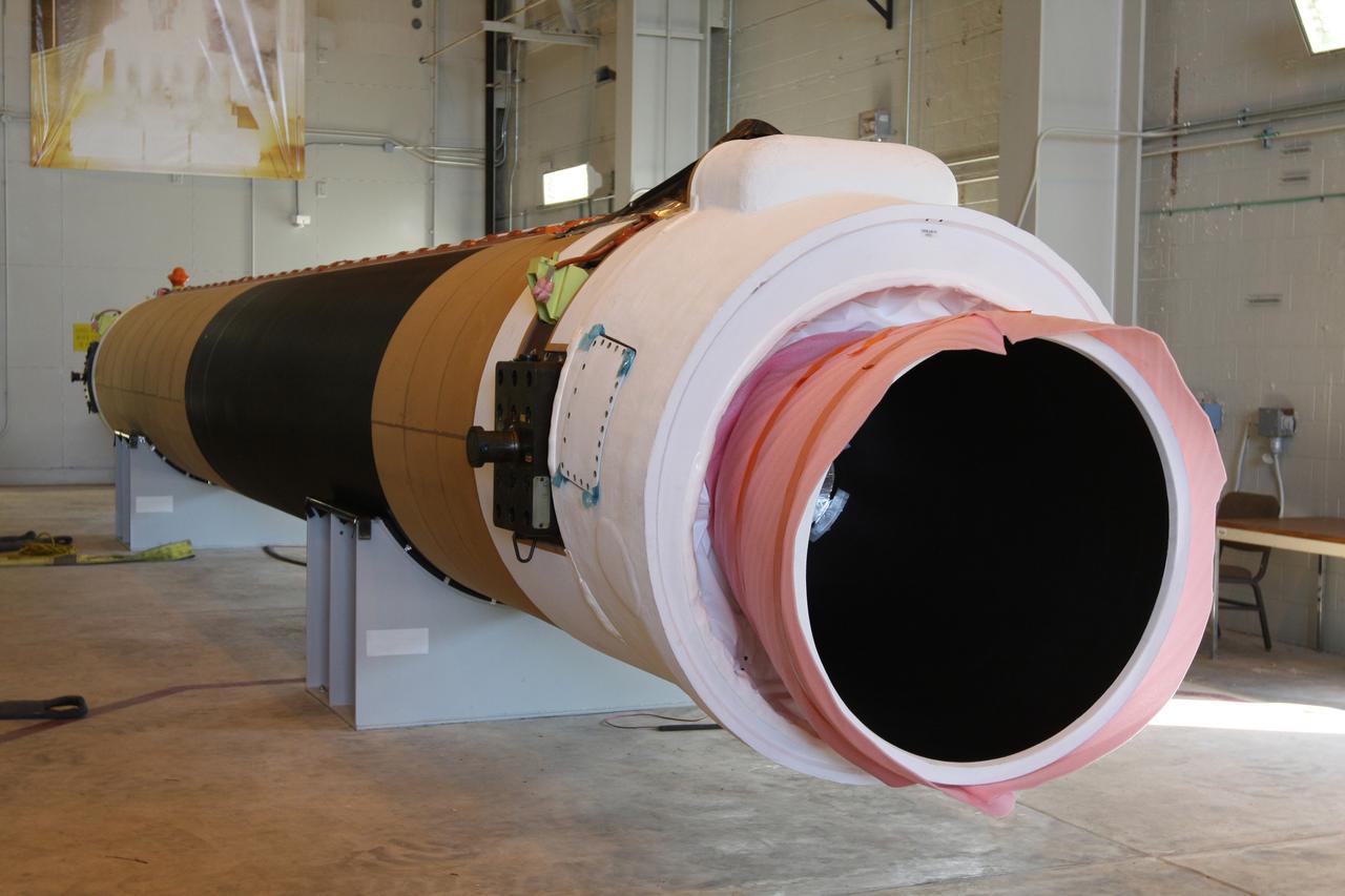 CAPE CANAVERAL, Fla. – At the Receipt Inspection Shop on Cape Canaveral Air Force Station in Florida, an ATK Space Systems' 60-inch graphite epoxy motor, or GEM, slated for launch of the GOES-P spacecraft rests on a work stand awaiting further processing. The United Launch Alliance Delta IV is the launch vehicle for GOES-P, the latest Geostationary Operational Environmental Satellite developed by NASA for the National Oceanic and Atmospheric Administration, or NOAA. Launch is targeted for March 4, 2010, from Launch Complex 37. For information on GOES-P, visit http://nasascience.nasa.gov/missions/goes-n-o-p. Photo credit: NASA/Dimitri Gerondidakis