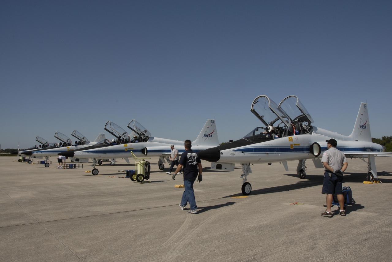 CAPE CANAVERAL, Fla. - T-38 jets are lined up on the tarmac of the Shuttle Landing Facility at NASA's Kennedy Space Center in Florida.  The crew members of space shuttle Atlantis' STS-129 mission were among the pilots and passengers.  The crew has arrived at Kennedy for training related to their launch dress rehearsal, the Terminal Countdown Demonstration Test.    Launch of Atlantis on its STS-129 mission to the International Space Station is targeted for November. For information on the STS-129 mission objectives and crew, visit http://www.nasa.gov/mission_pages/shuttle/shuttlemissions/sts129/index.html. Photo credit: NASA/Kim Shiflett